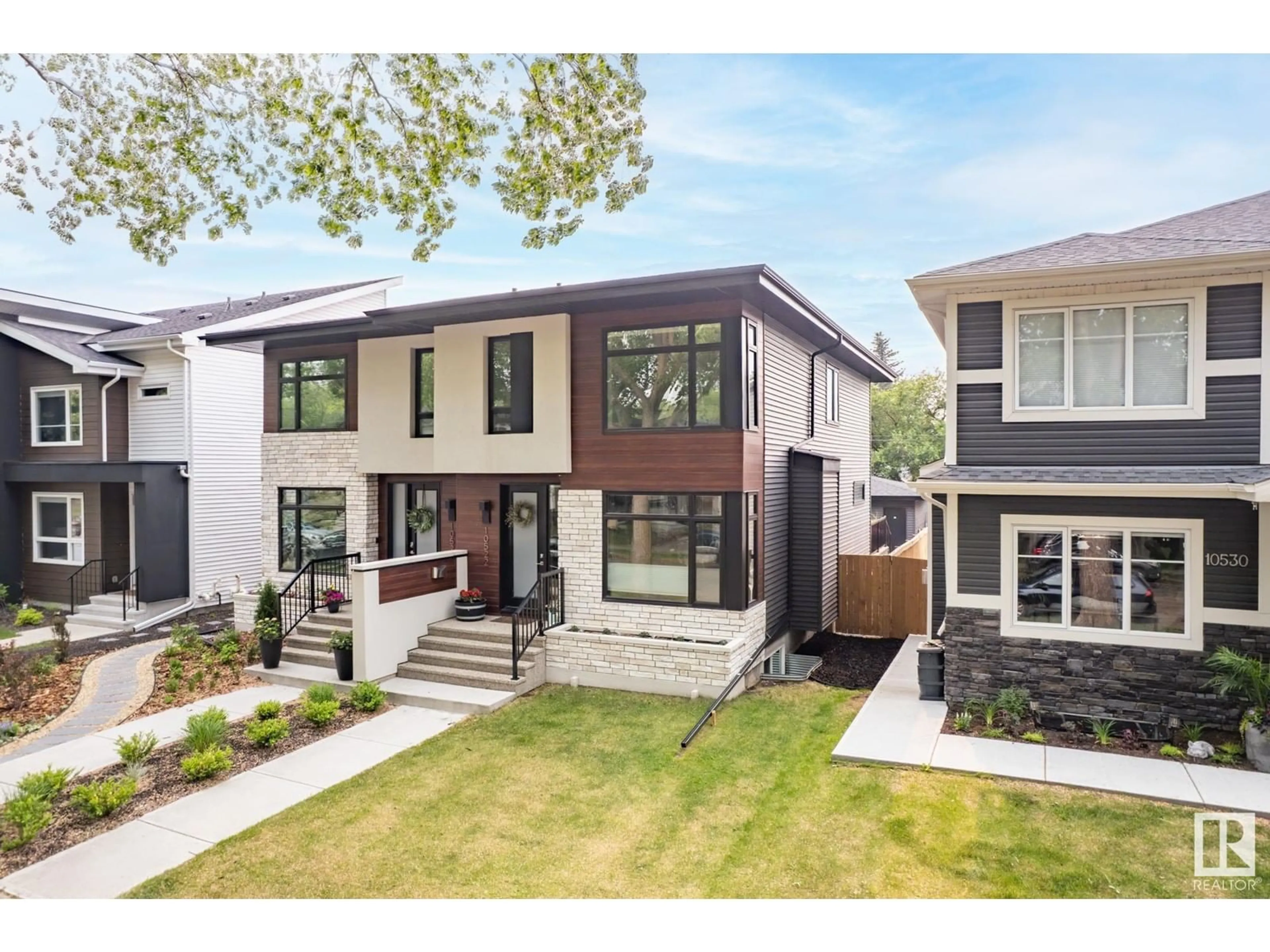 Home with brick exterior material, street for NW - 10522 83 ST, Edmonton Alberta T6A3P4