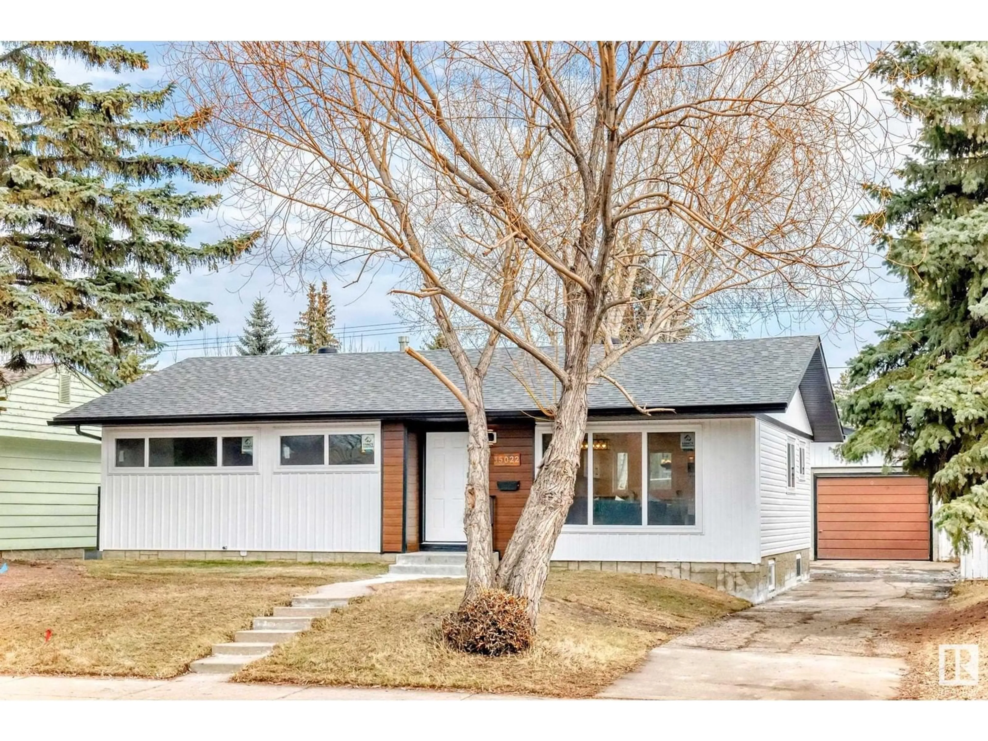Home with brick exterior material, street for 15022 86 AV, Edmonton Alberta T5R4C1