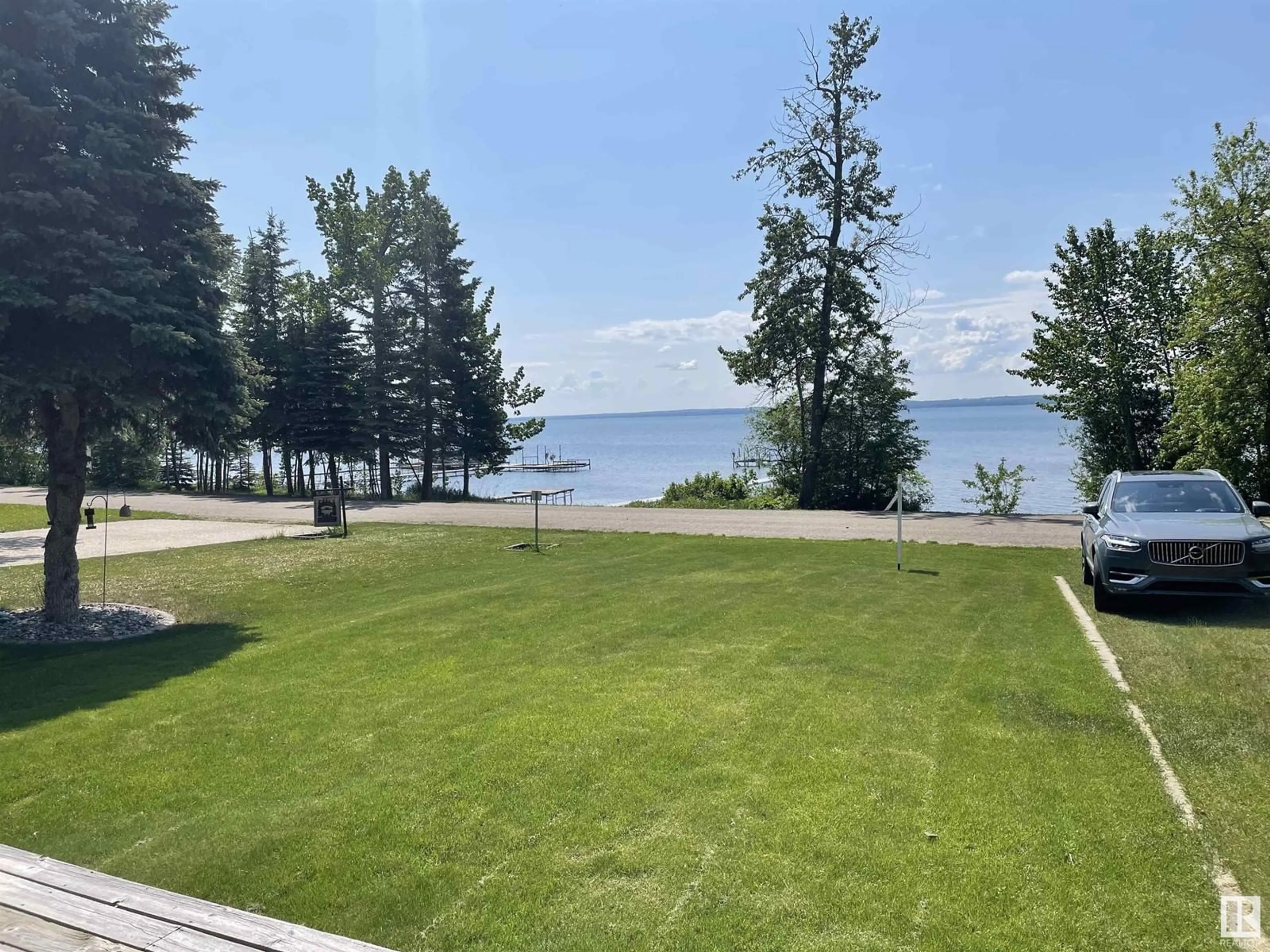 A pic from outside/outdoor area/front of a property/back of a property/a pic from drone, water/lake/river/ocean view for 47436 RGE ROAD 15, Rural Leduc County Alberta T0C2P0
