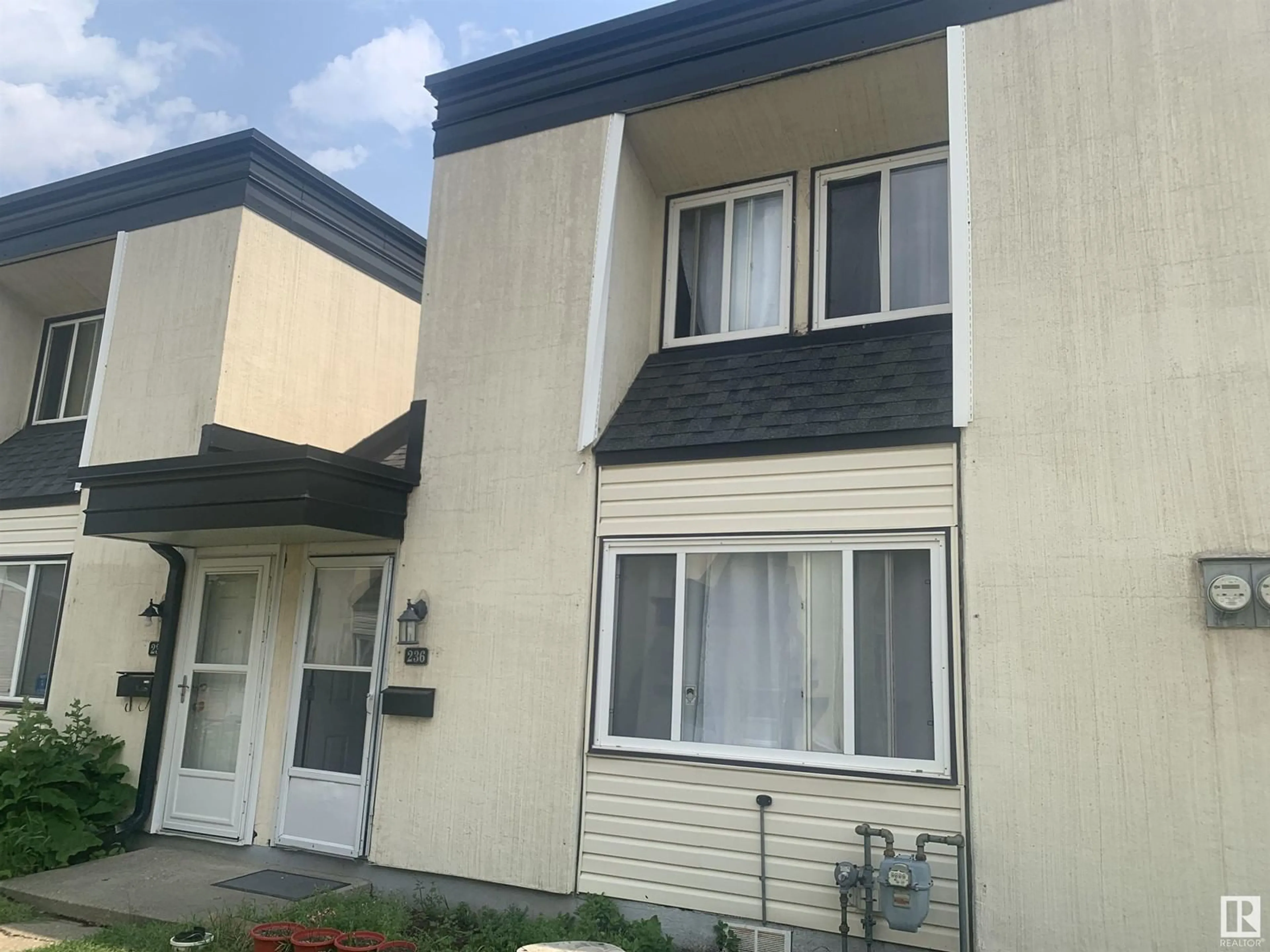 Home with vinyl exterior material, building for 236 - 3307 116A AV, Edmonton Alberta T5W5J9