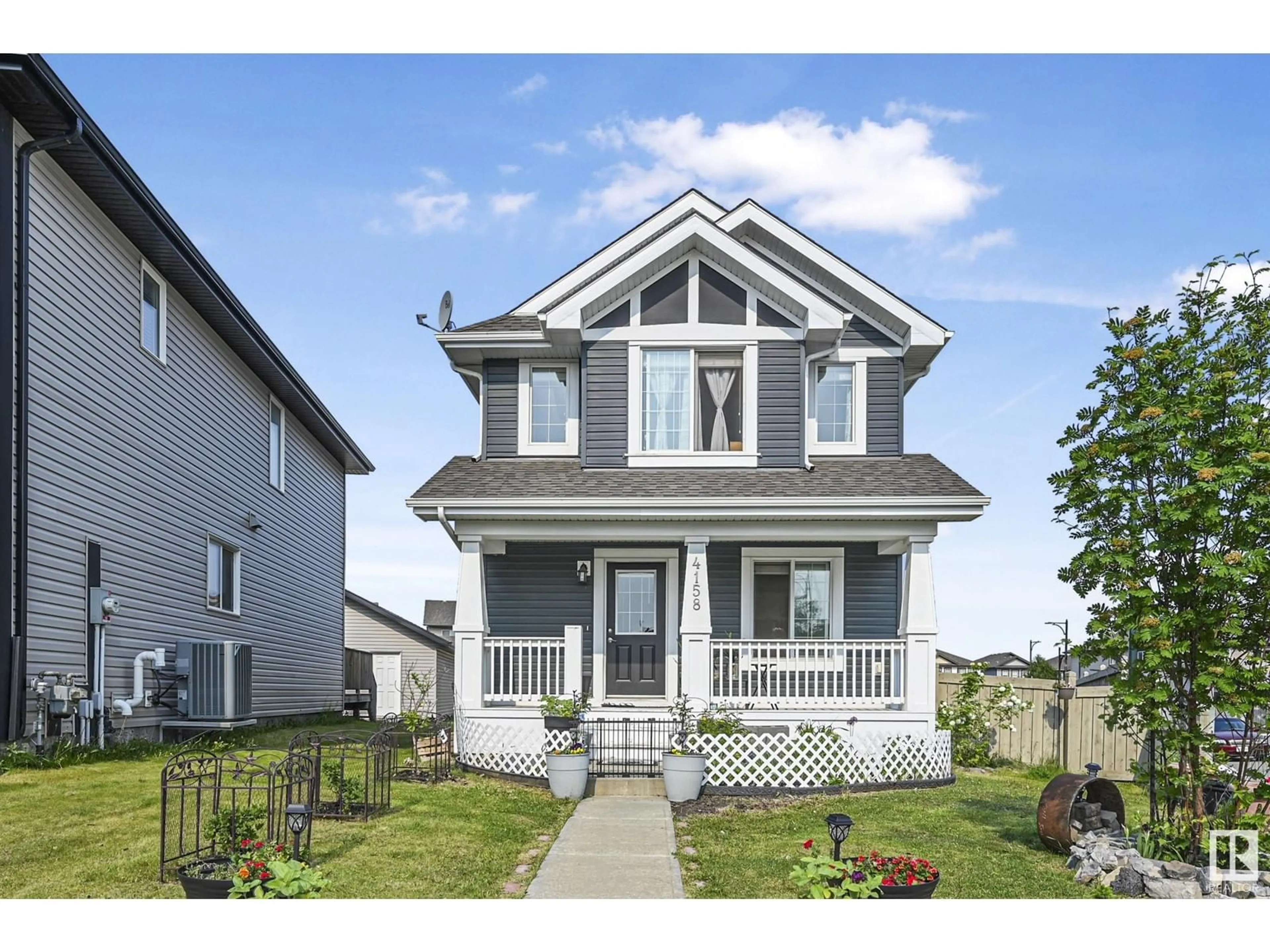 Home with vinyl exterior material, street for 6A - 4158 6A ST ST, Edmonton Alberta T6T0W9