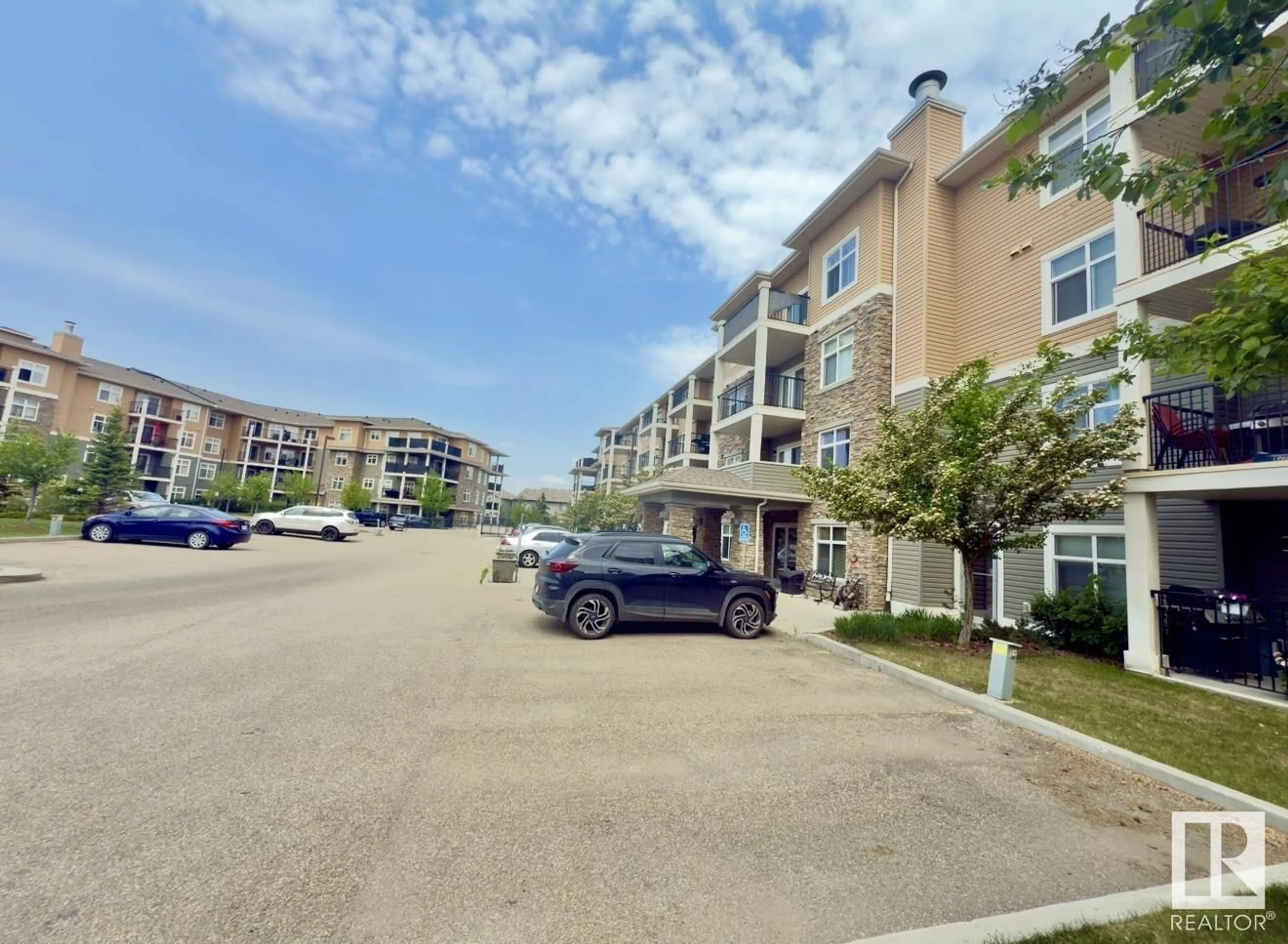 A pic from outside/outdoor area/front of a property/back of a property/a pic from drone, unknown for 6070 - 313 SCHONSEE WY, Edmonton Alberta T5G0G8