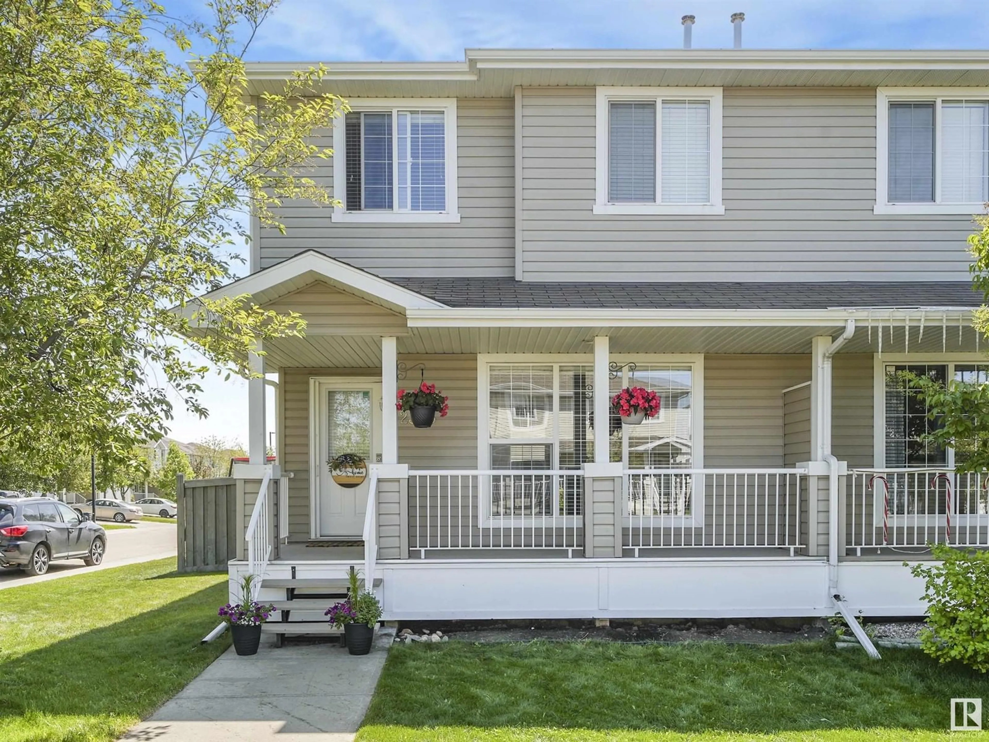 Home with vinyl exterior material, street for 2305 28A AV, Edmonton Alberta T6T0A2