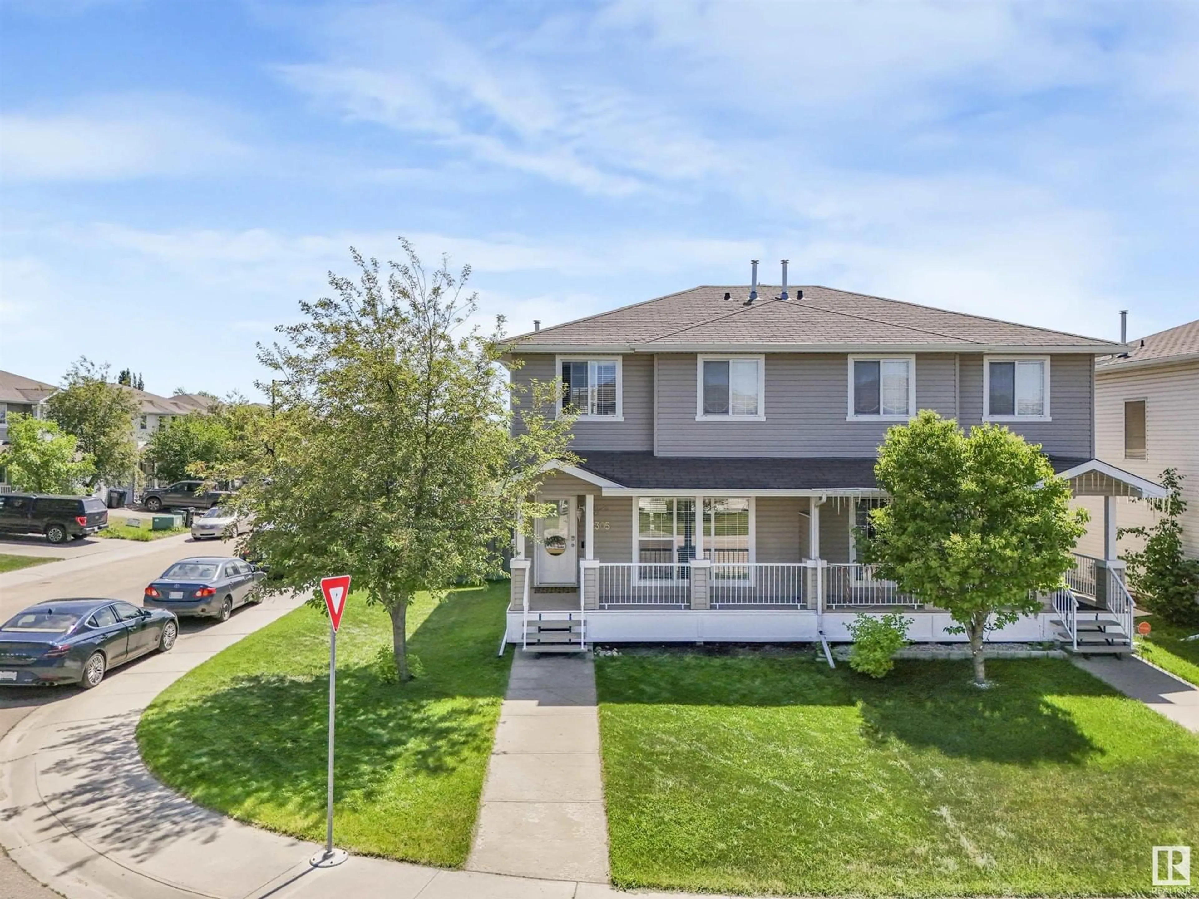 A pic from outside/outdoor area/front of a property/back of a property/a pic from drone, street for 2305 28A AV, Edmonton Alberta T6T0A2