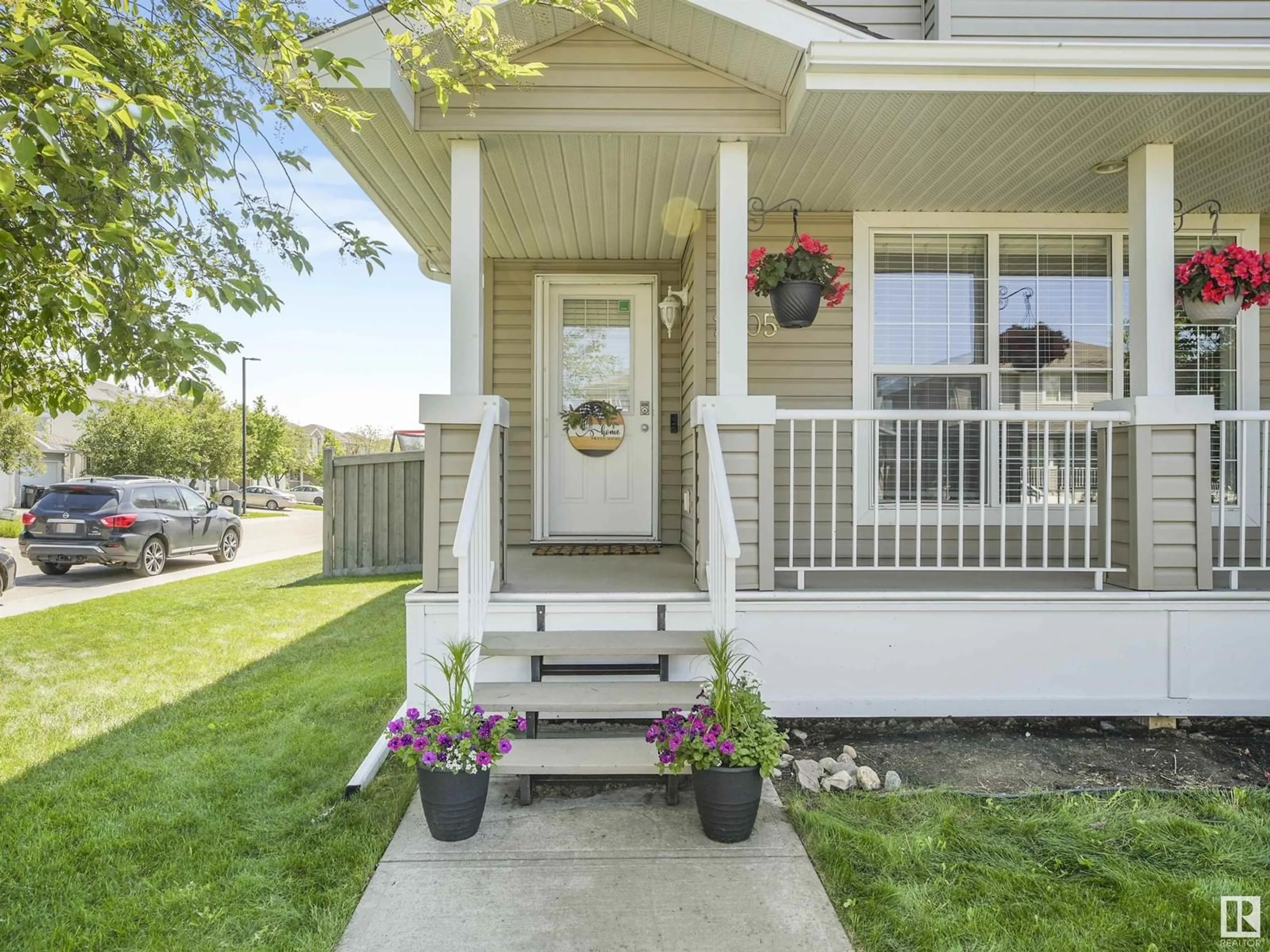 Home with vinyl exterior material, street for 2305 28A AV, Edmonton Alberta T6T0A2