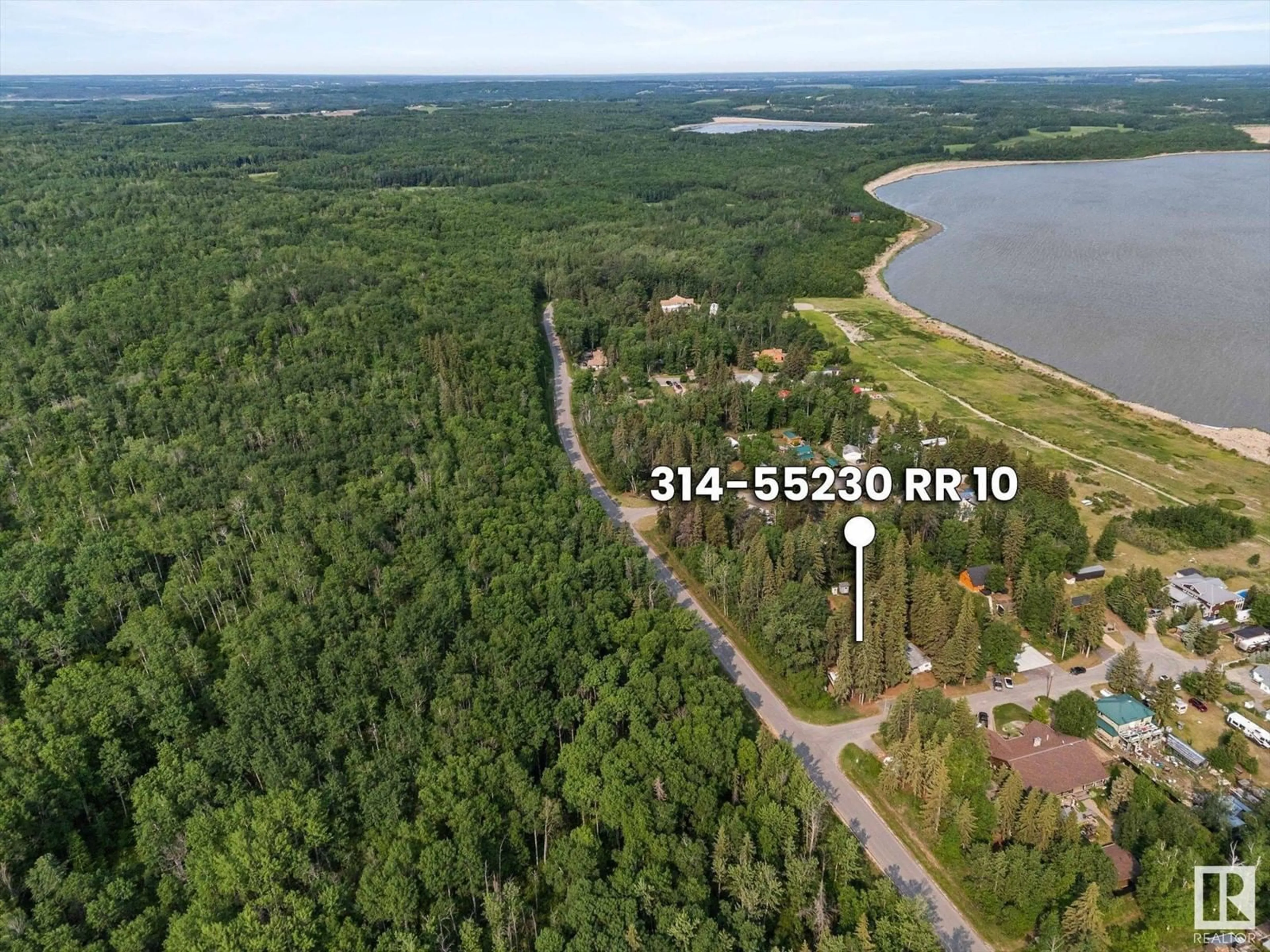 A pic from outside/outdoor area/front of a property/back of a property/a pic from drone, water/lake/river/ocean view for #314 & 315 - 55230 RGE ROAD 10, Rural Sturgeon County Alberta T8R0K4