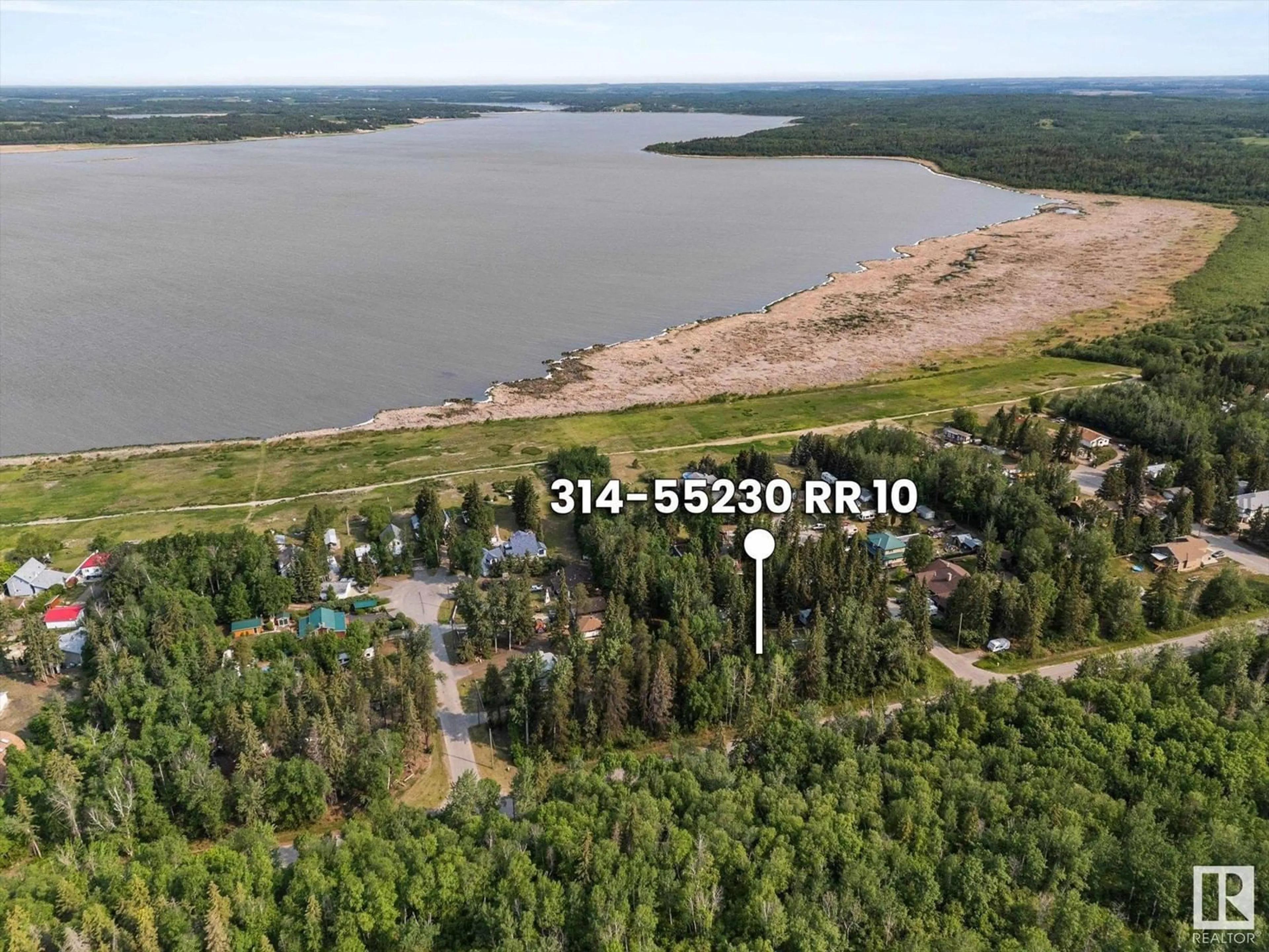 A pic from outside/outdoor area/front of a property/back of a property/a pic from drone, water/lake/river/ocean view for #314 & 315 - 55230 RGE ROAD 10, Rural Sturgeon County Alberta T8R0K4