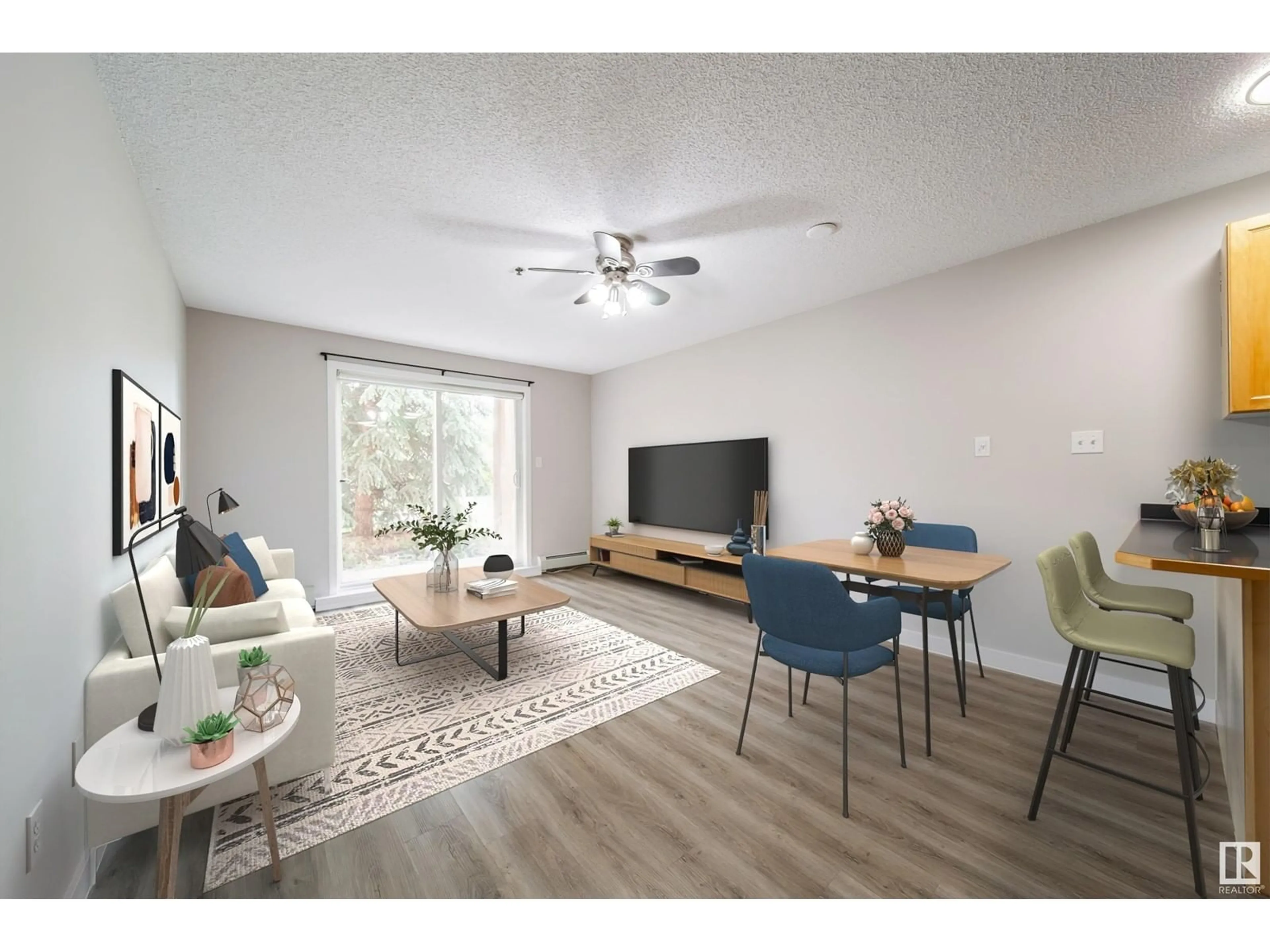 Living room with furniture, wood/laminate floor for #117 - 2305 35A AV, Edmonton Alberta T6T1Z2