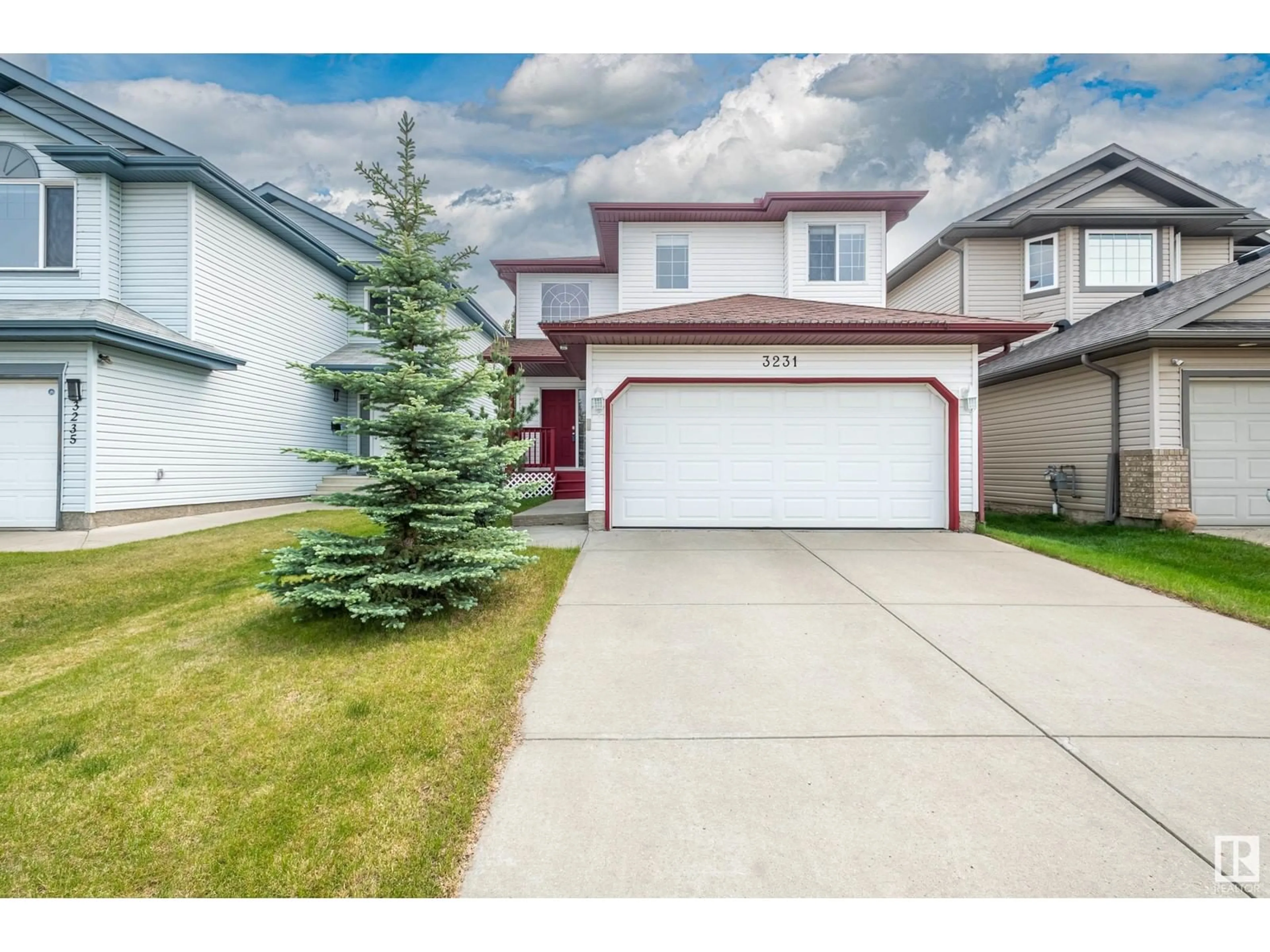 Home with vinyl exterior material, street for NW - 3231 21 ST, Edmonton Alberta T6T0A9