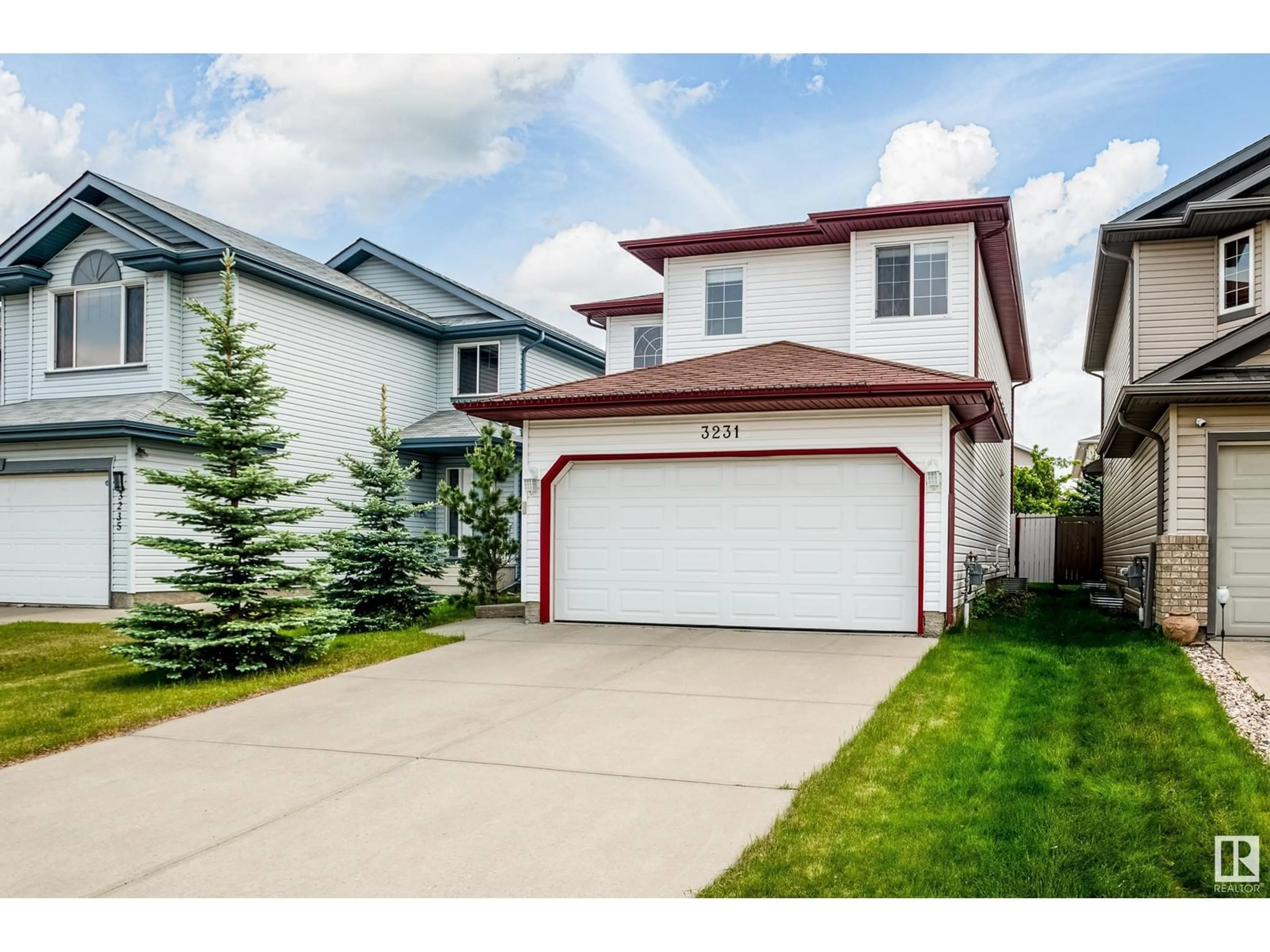 Home with vinyl exterior material, street for NW - 3231 21 ST, Edmonton Alberta T6T0A9