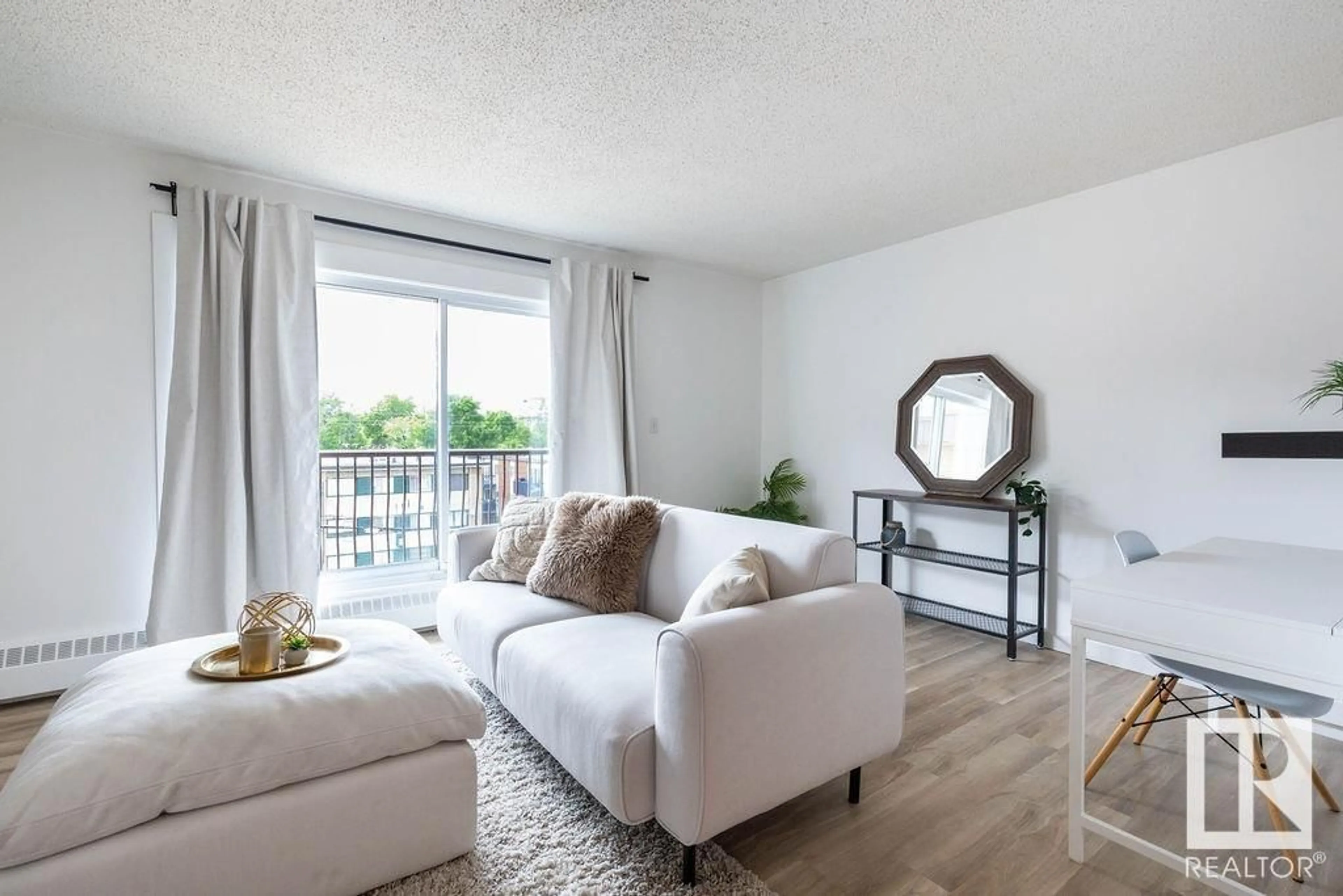 Living room with furniture, wood/laminate floor for #52 - 10208 113 ST NW, Edmonton Alberta T5K1P4