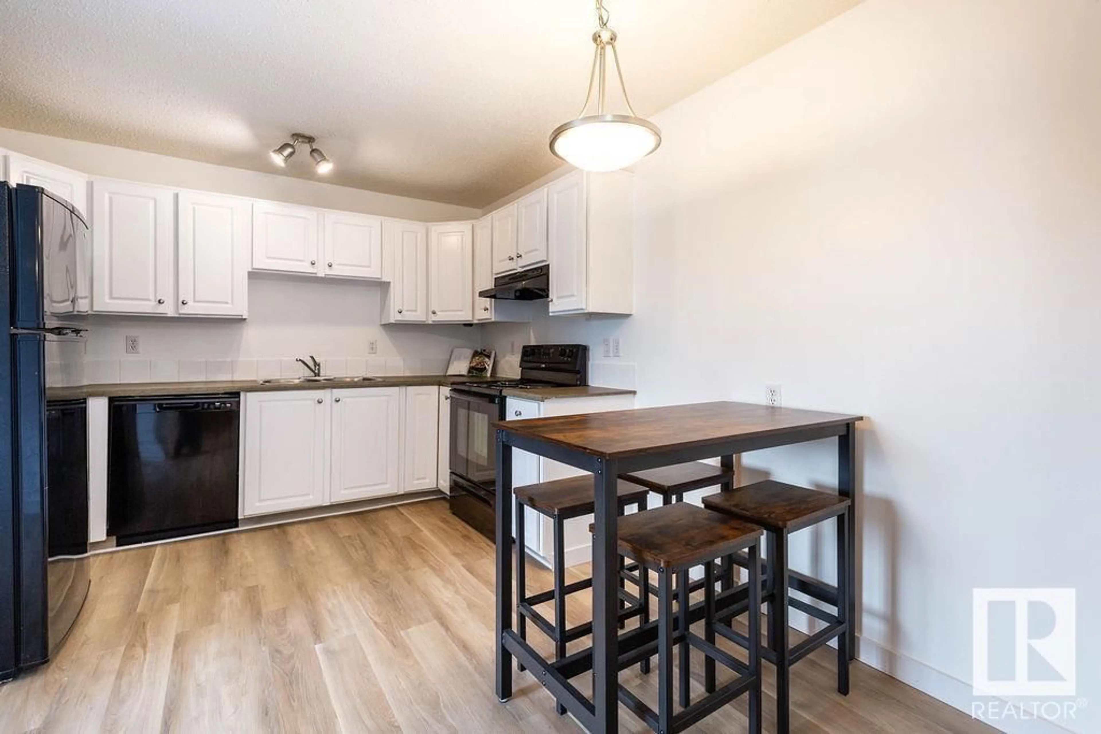 Standard kitchen, wood/laminate floor for #52 - 10208 113 ST NW, Edmonton Alberta T5K1P4