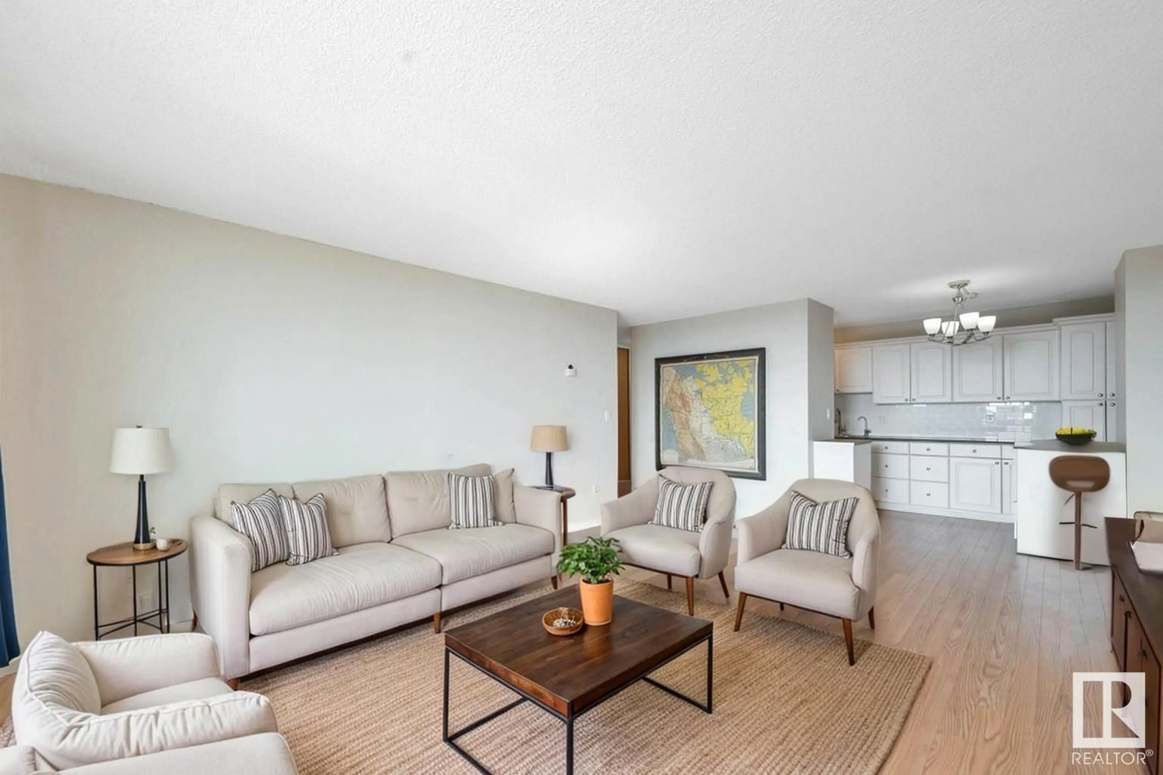 Living room with furniture, unknown for 511 STONY PLAIN RD, Edmonton Alberta T5N3R2