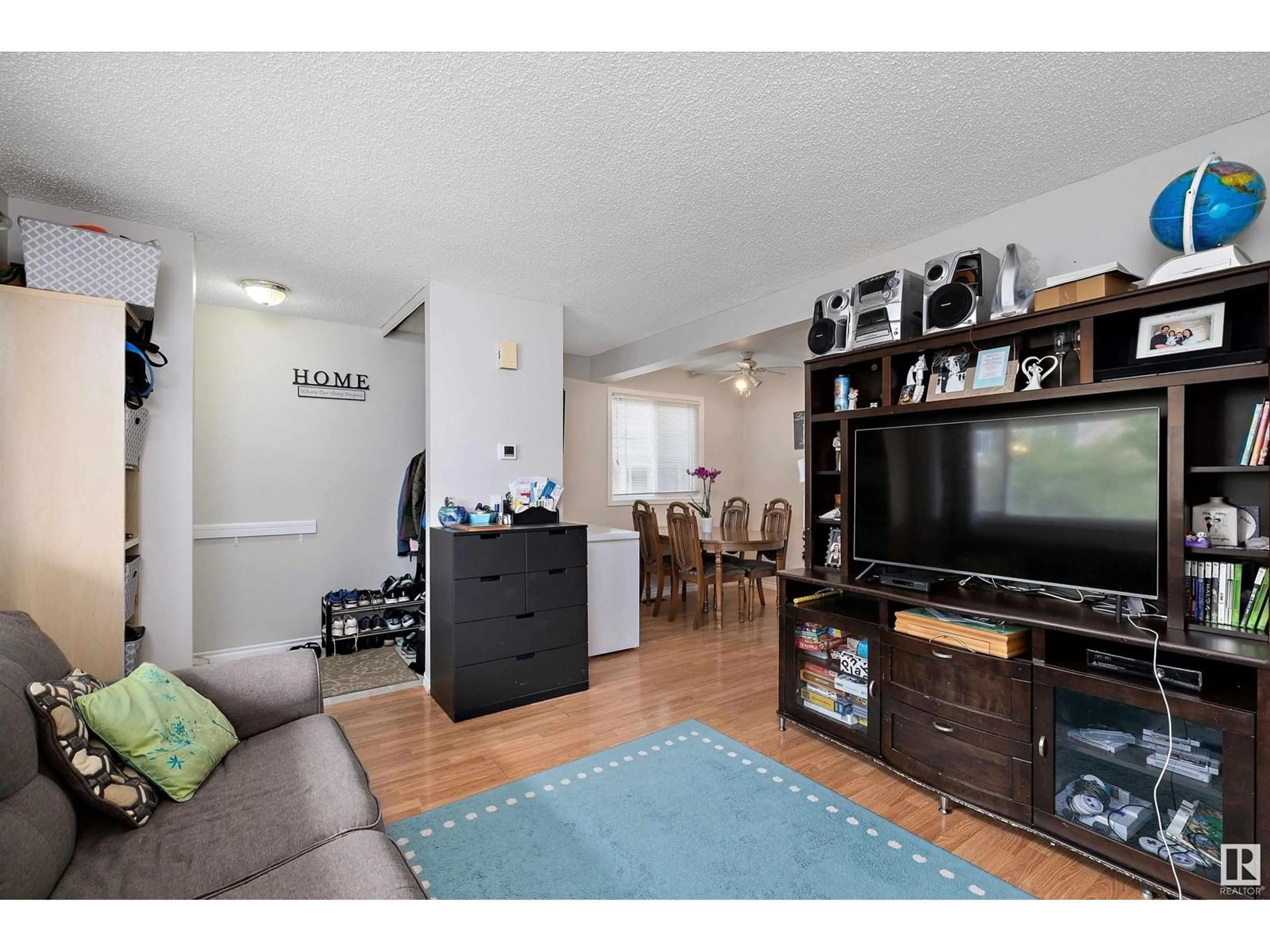 Living room with furniture, wood/laminate floor for 749 VILLAGE DR, Sherwood Park Alberta T8A4H9