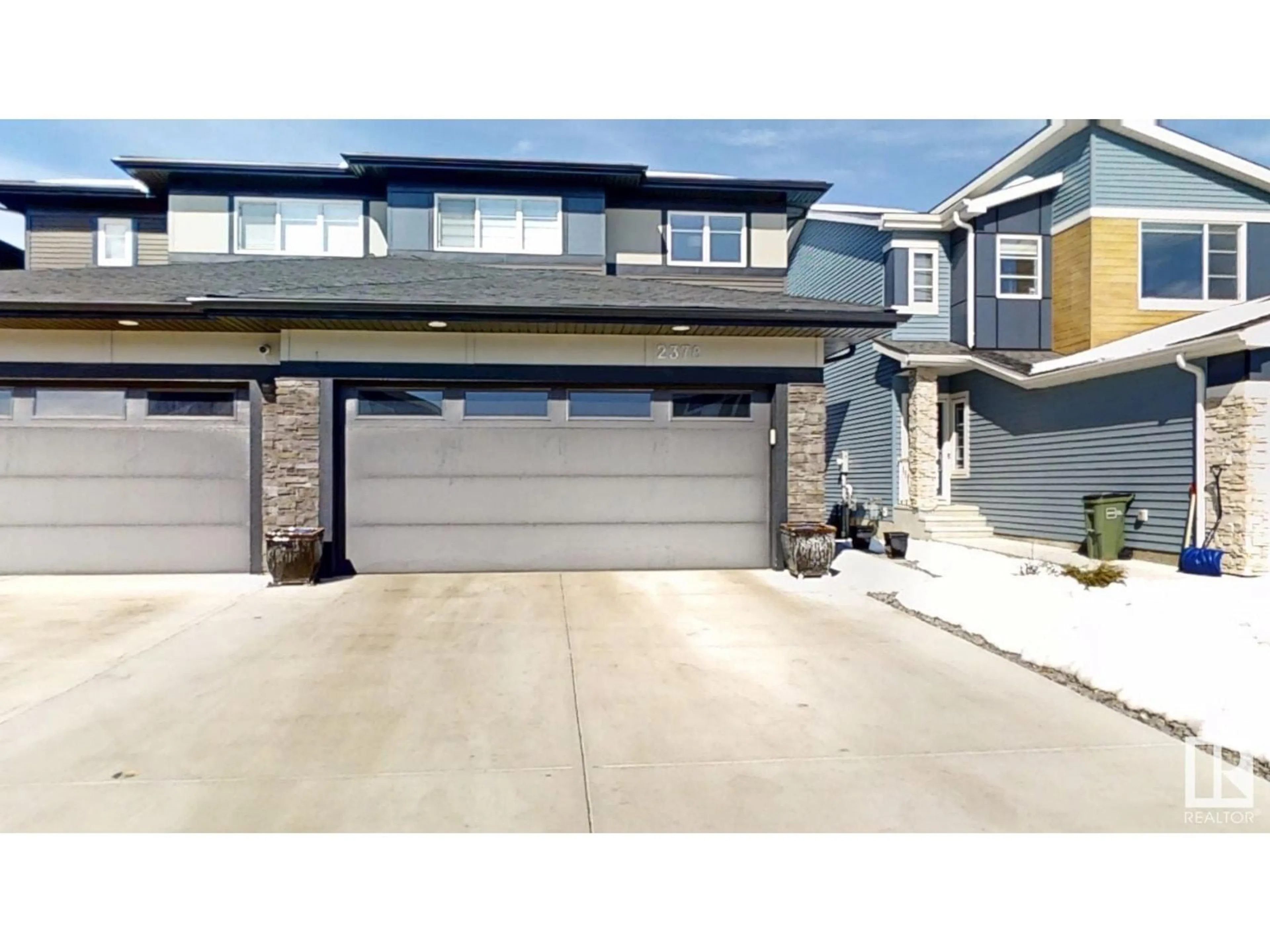 Home with vinyl exterior material, street for 2378 KELLY CI, Edmonton Alberta T6W4K2