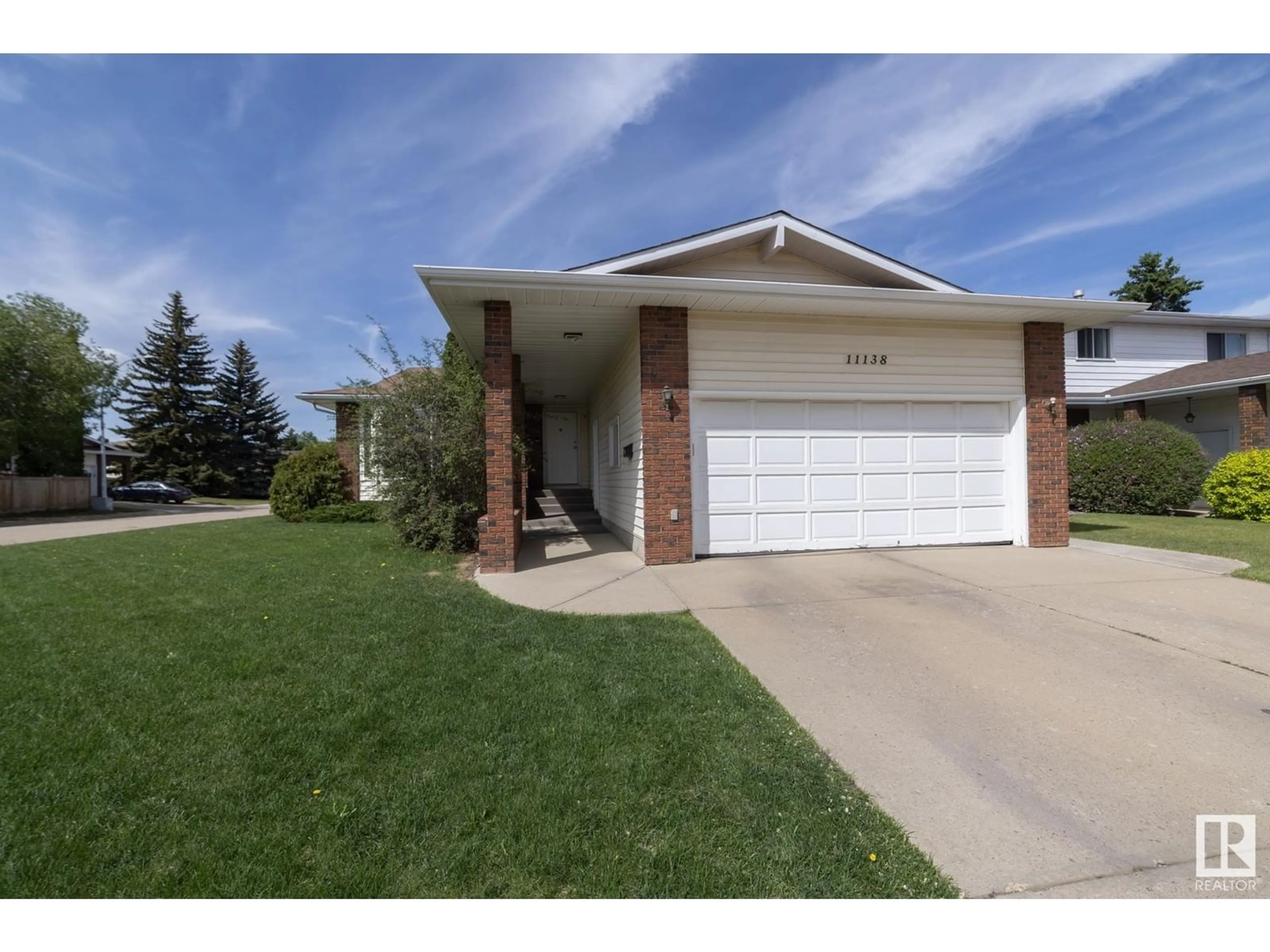 Home with vinyl exterior material, street for 11138 30 AV, Edmonton Alberta T6J3Y6