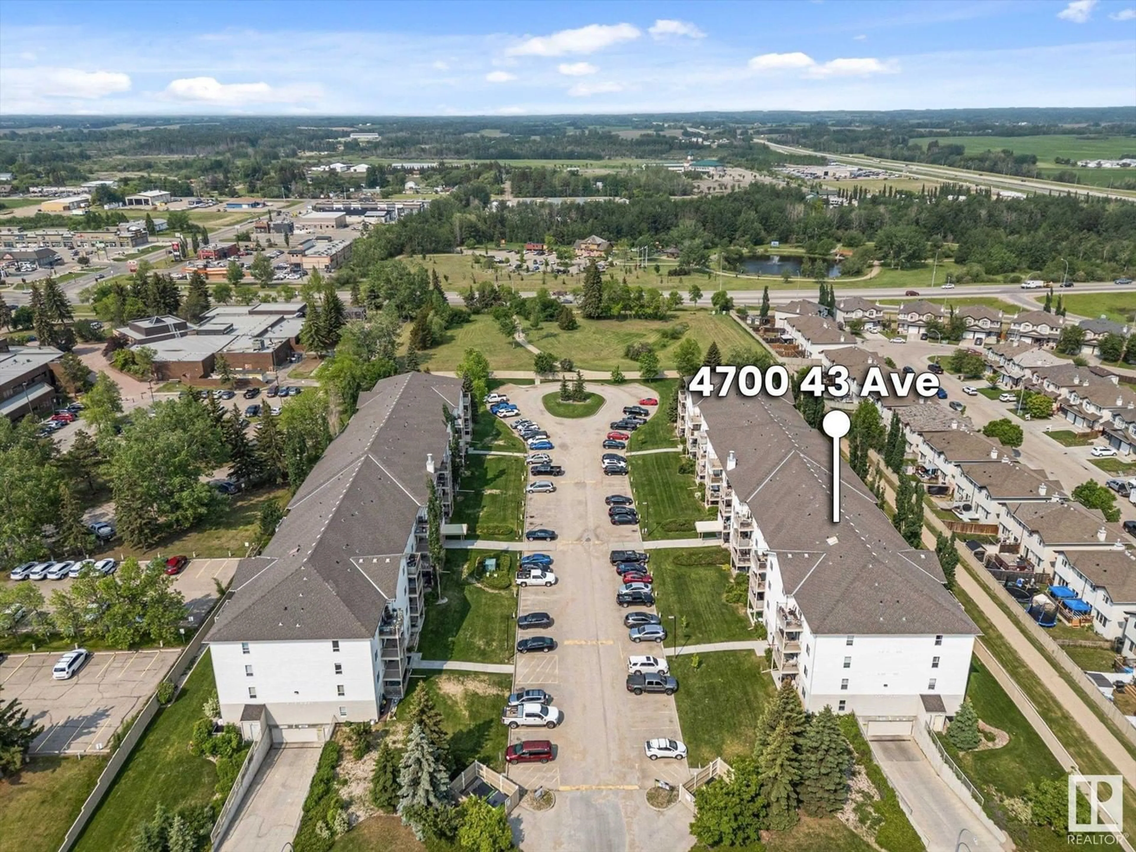 A pic from outside/outdoor area/front of a property/back of a property/a pic from drone, city buildings view from balcony for #402 - 4700 43 AV, Stony Plain Alberta T7Z2S6