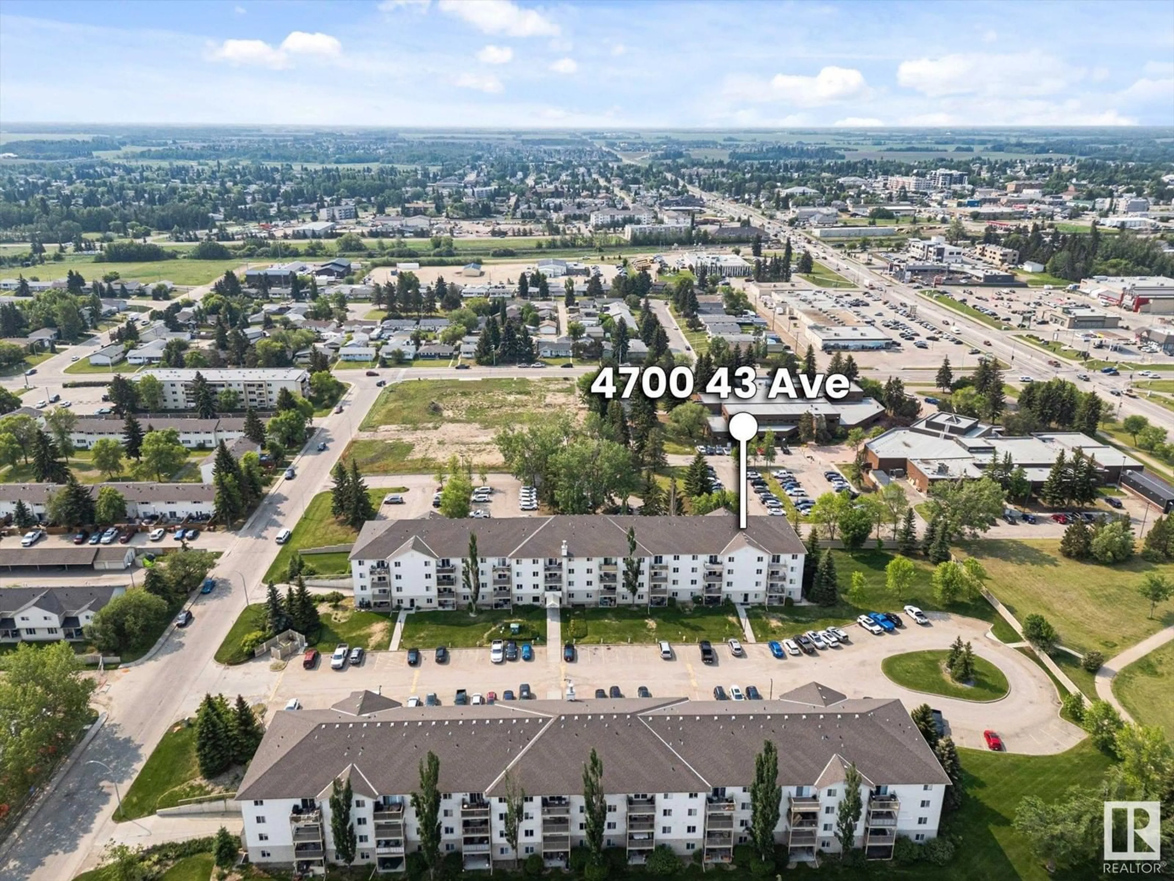 A pic from outside/outdoor area/front of a property/back of a property/a pic from drone, unknown for #402 - 4700 43 AV, Stony Plain Alberta T7Z2S6