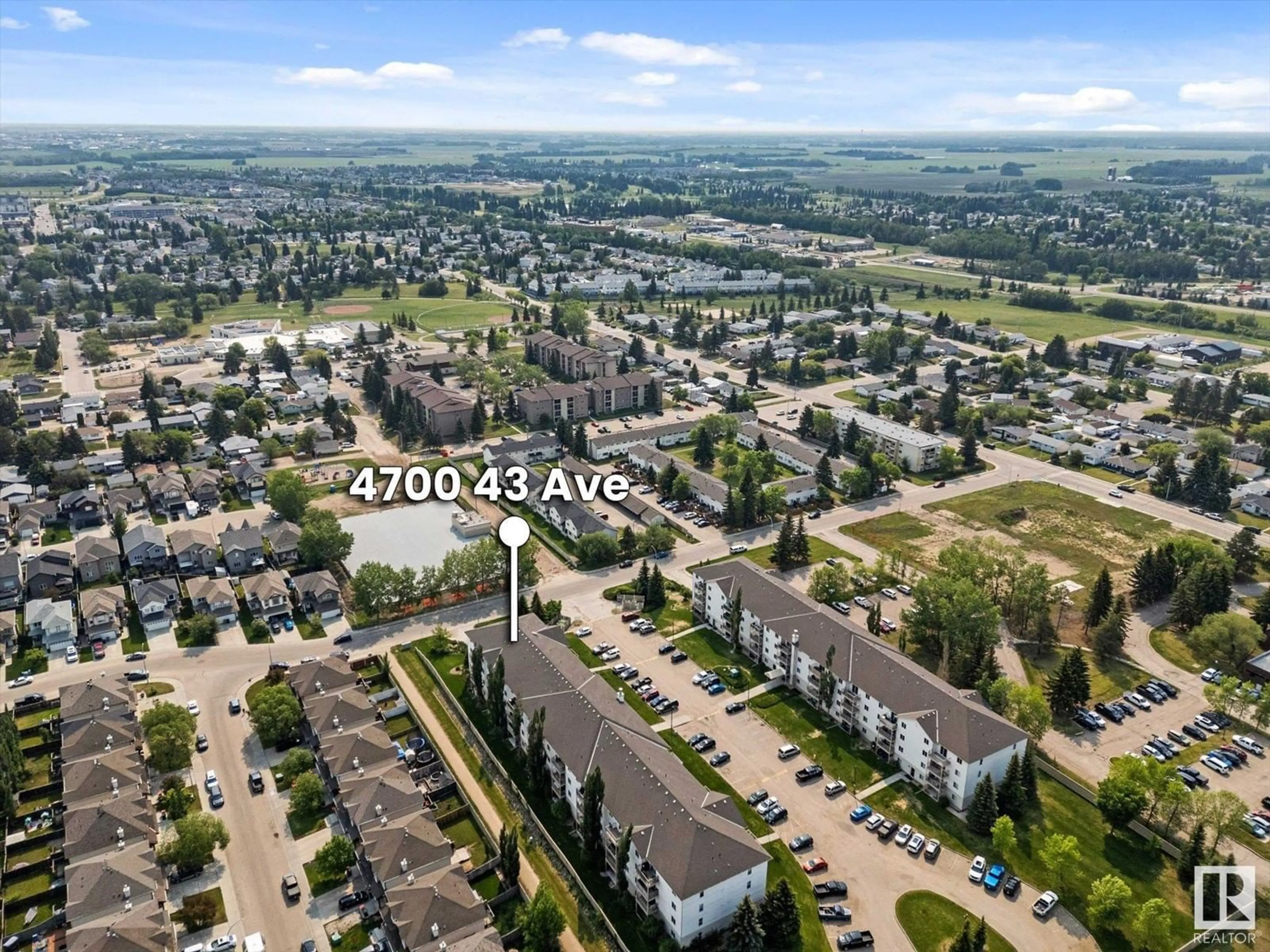 A pic from outside/outdoor area/front of a property/back of a property/a pic from drone, unknown for #402 - 4700 43 AV, Stony Plain Alberta T7Z2S6