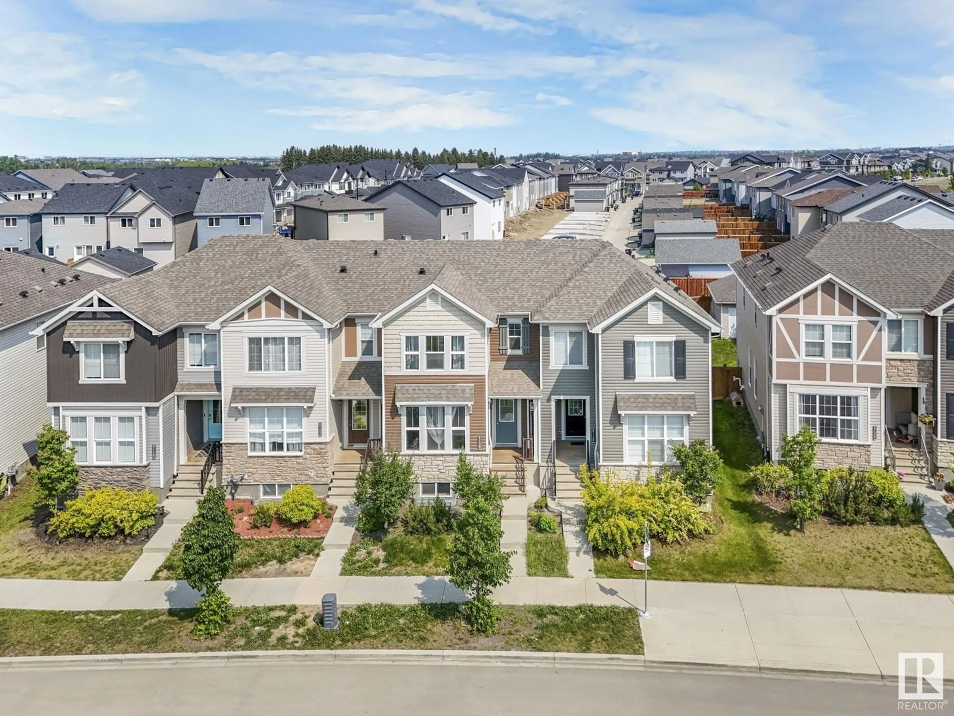 A pic from outside/outdoor area/front of a property/back of a property/a pic from drone, unknown for 8130 CHAPPELLE WY, Edmonton Alberta T6W3R2