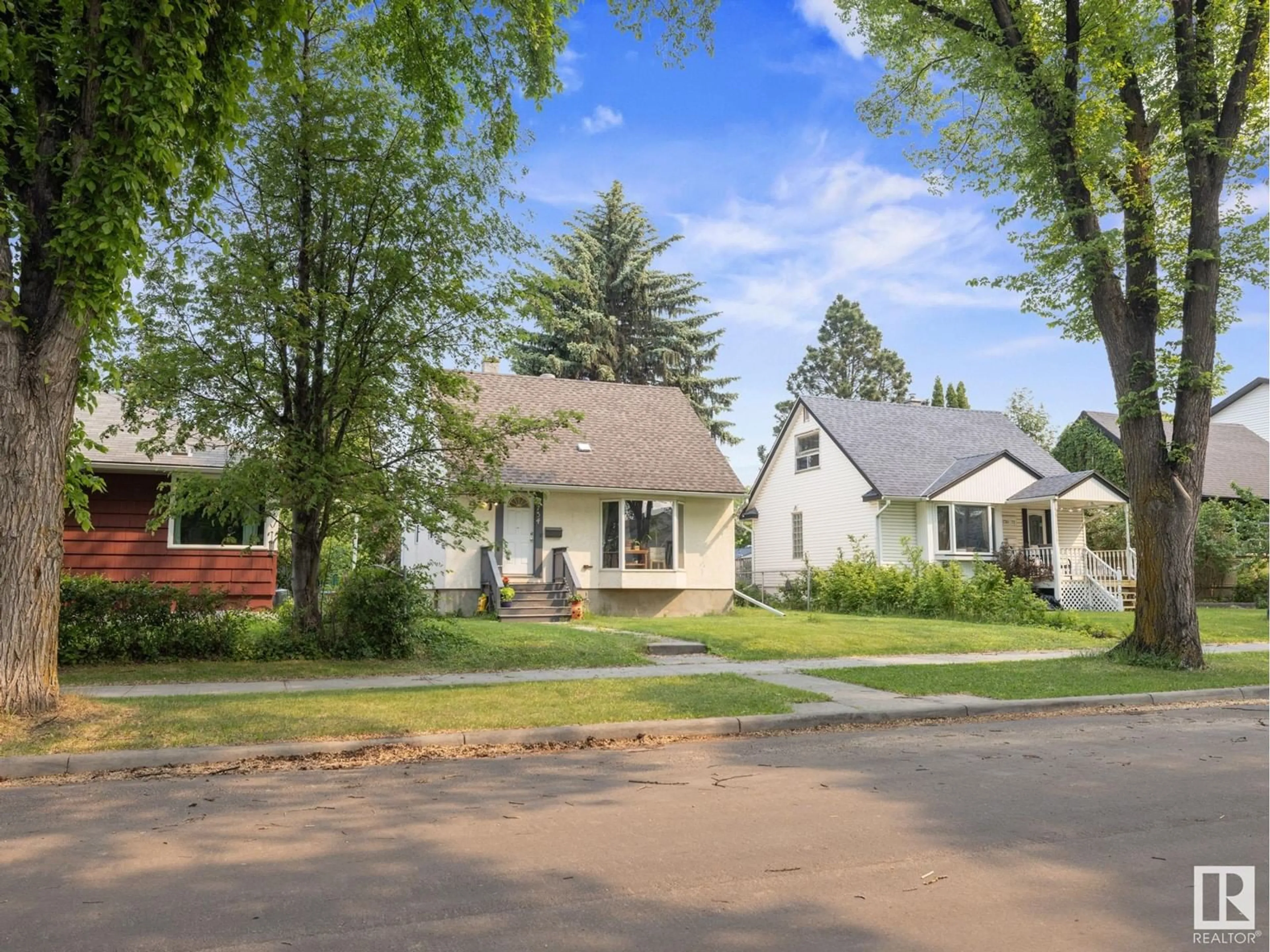A pic from outside/outdoor area/front of a property/back of a property/a pic from drone, street for 9734 71 AV, Edmonton Alberta T6E0W6