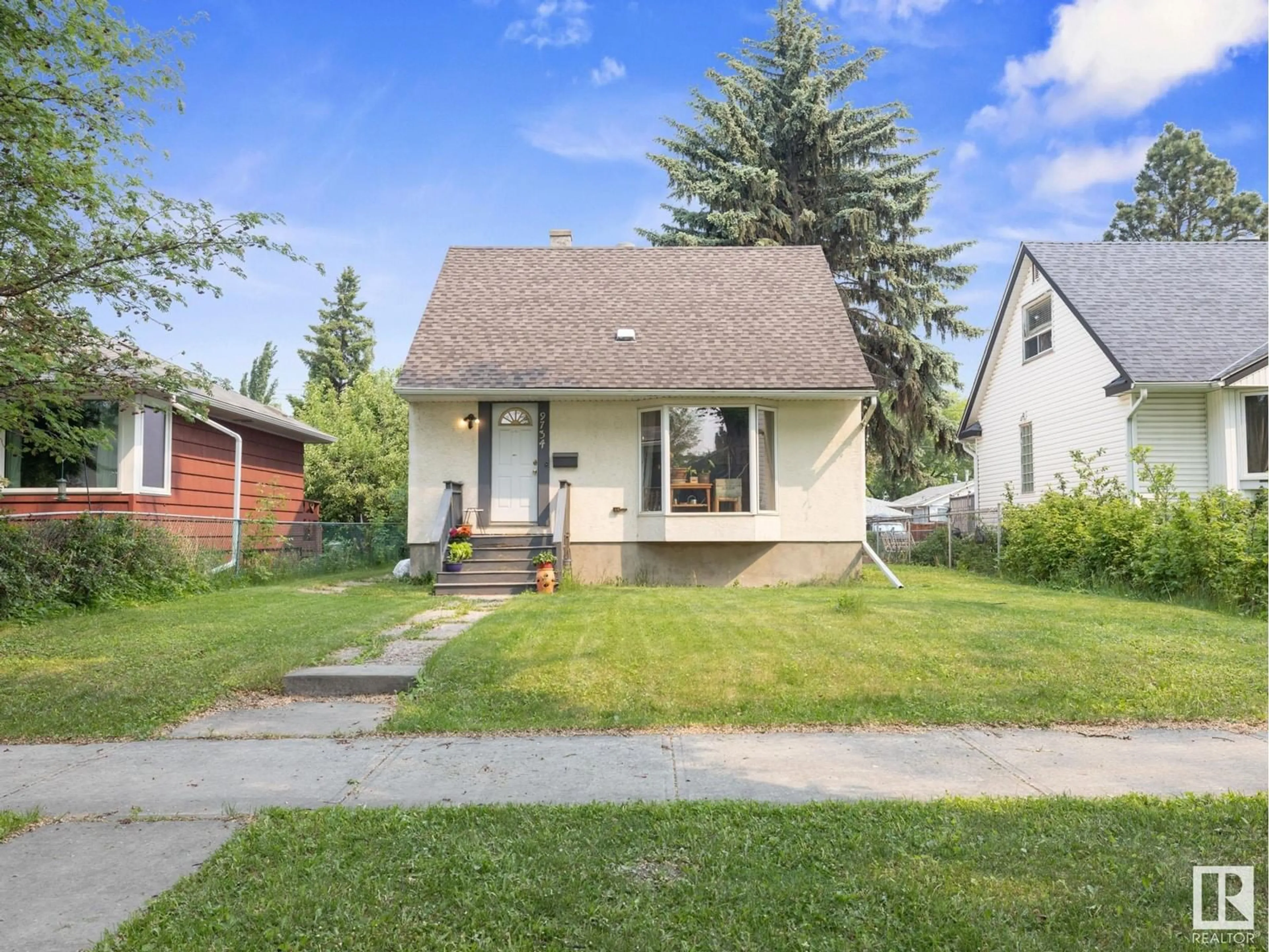 A pic from outside/outdoor area/front of a property/back of a property/a pic from drone, street for 9734 71 AV, Edmonton Alberta T6E0W6