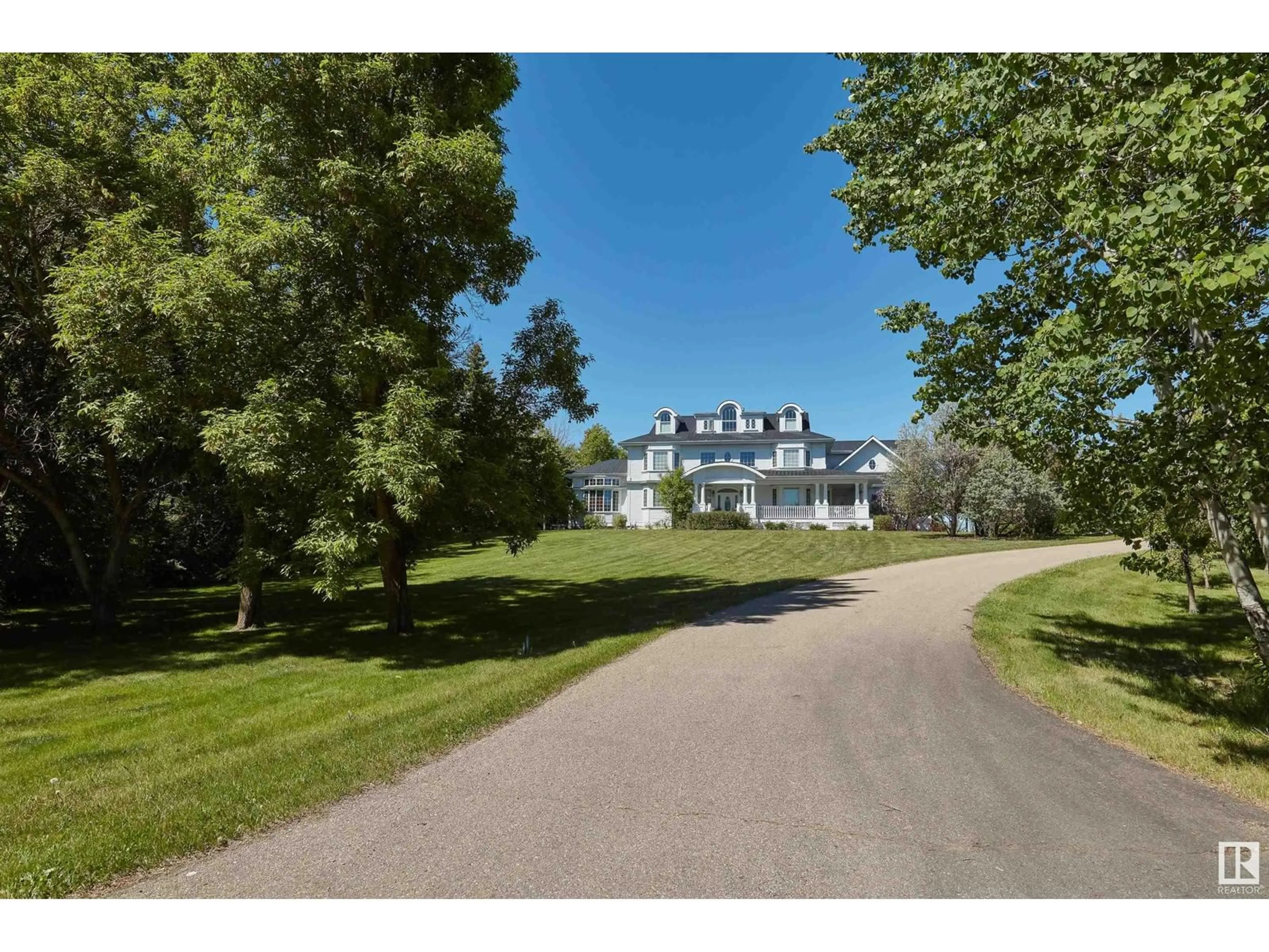 A pic from outside/outdoor area/front of a property/back of a property/a pic from drone, unknown for 22459 - 55 TOWNSHIP ROAD 530, Rural Strathcona County Alberta T8E2K5