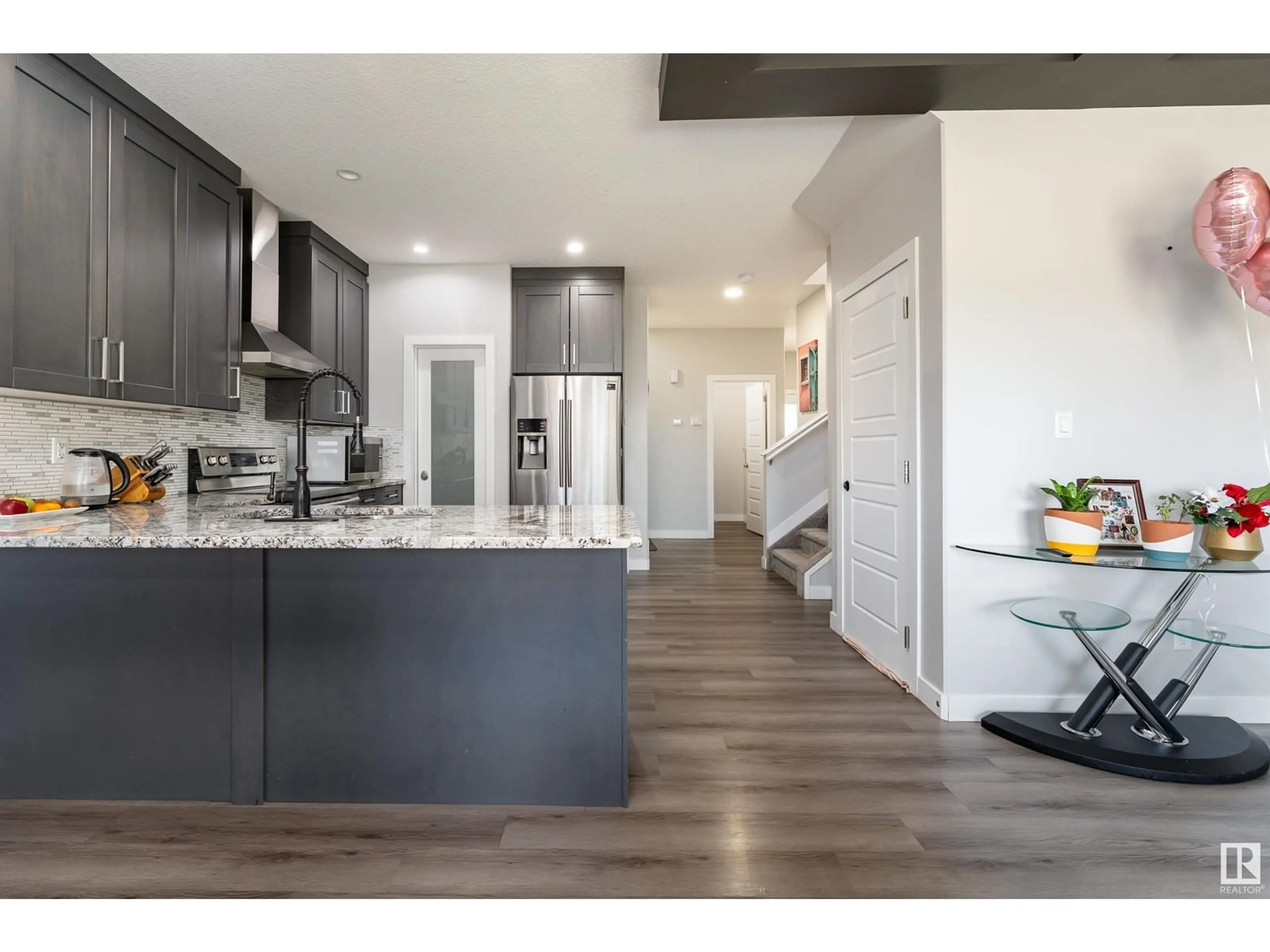 Open concept kitchen, unknown for NW - 16738 65A ST, Edmonton Alberta T5Y3X8