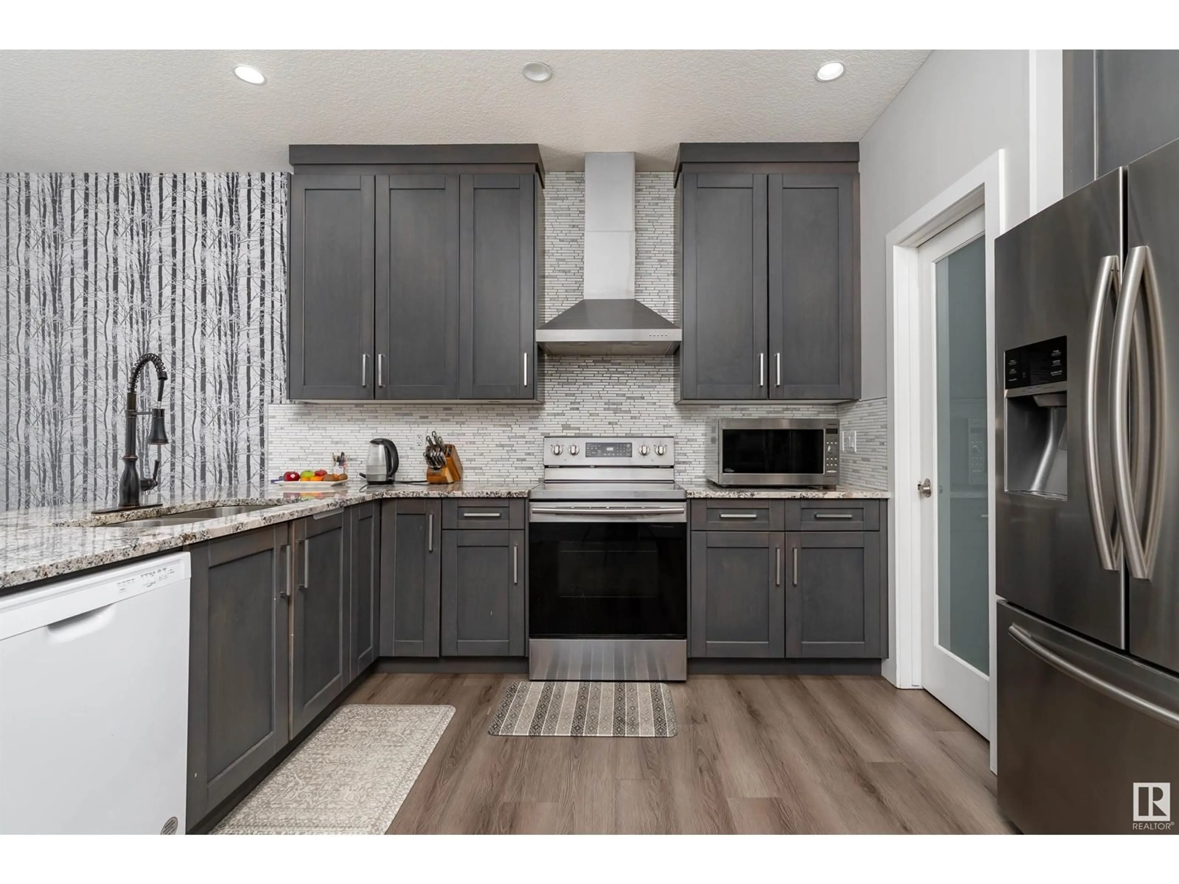 Open concept kitchen, unknown for NW - 16738 65A ST, Edmonton Alberta T5Y3X8