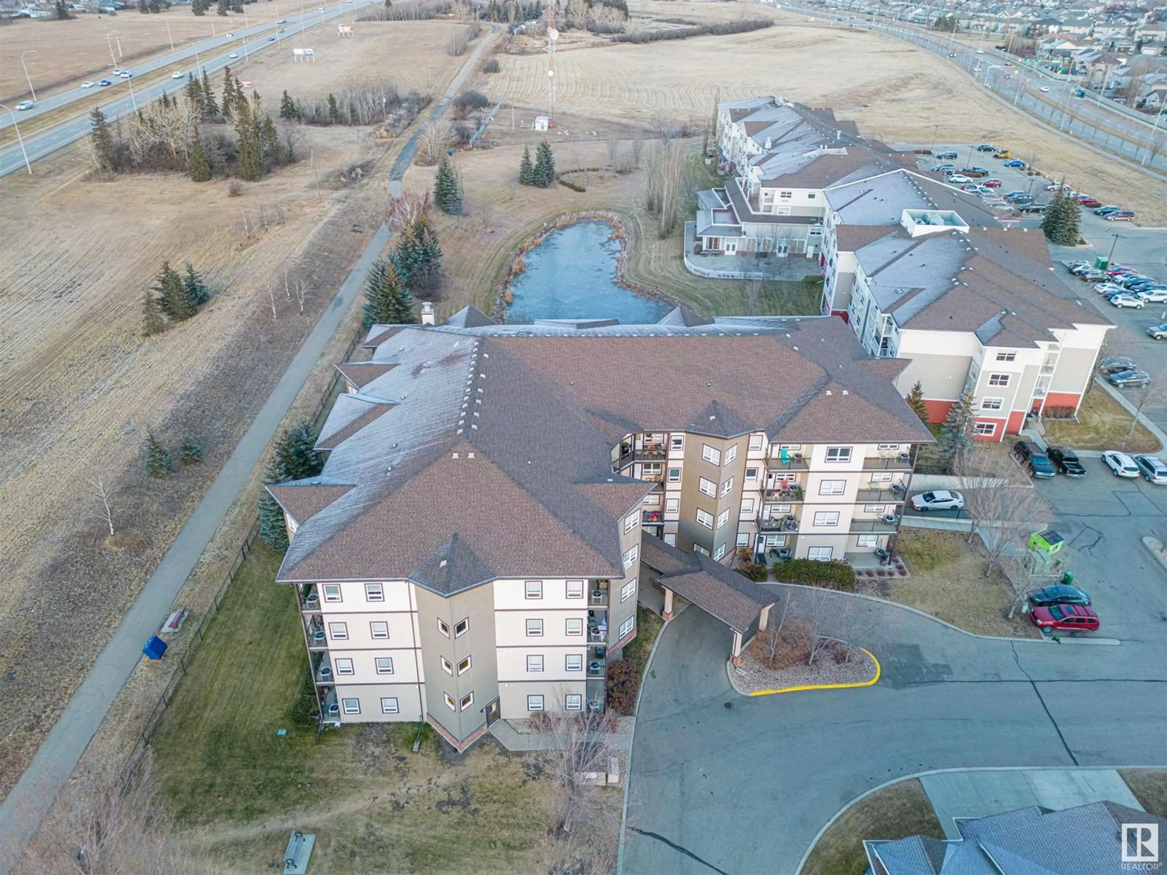 A pic from outside/outdoor area/front of a property/back of a property/a pic from drone, city buildings view from balcony for #406 - 8702 SOUTHFORT DR, Fort Saskatchewan Alberta T8L4R6