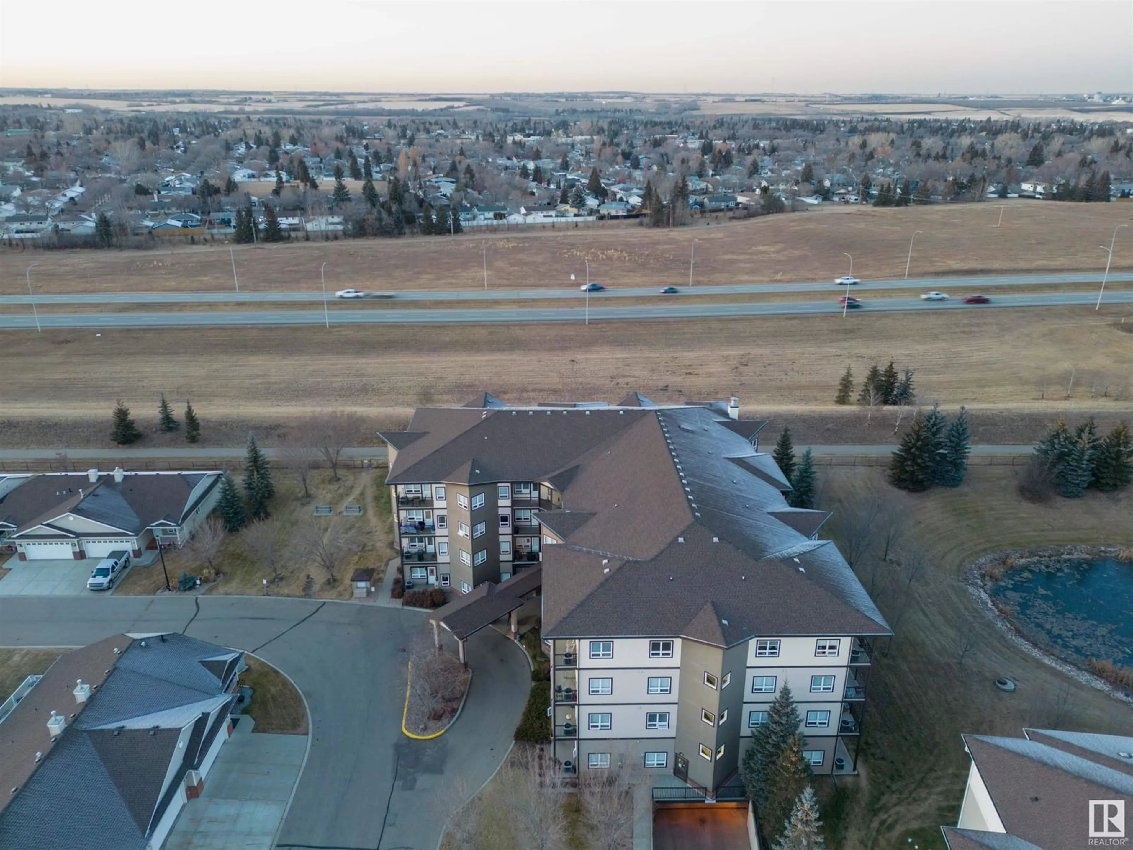 A pic from outside/outdoor area/front of a property/back of a property/a pic from drone, city buildings view from balcony for #406 - 8702 SOUTHFORT DR, Fort Saskatchewan Alberta T8L4R6