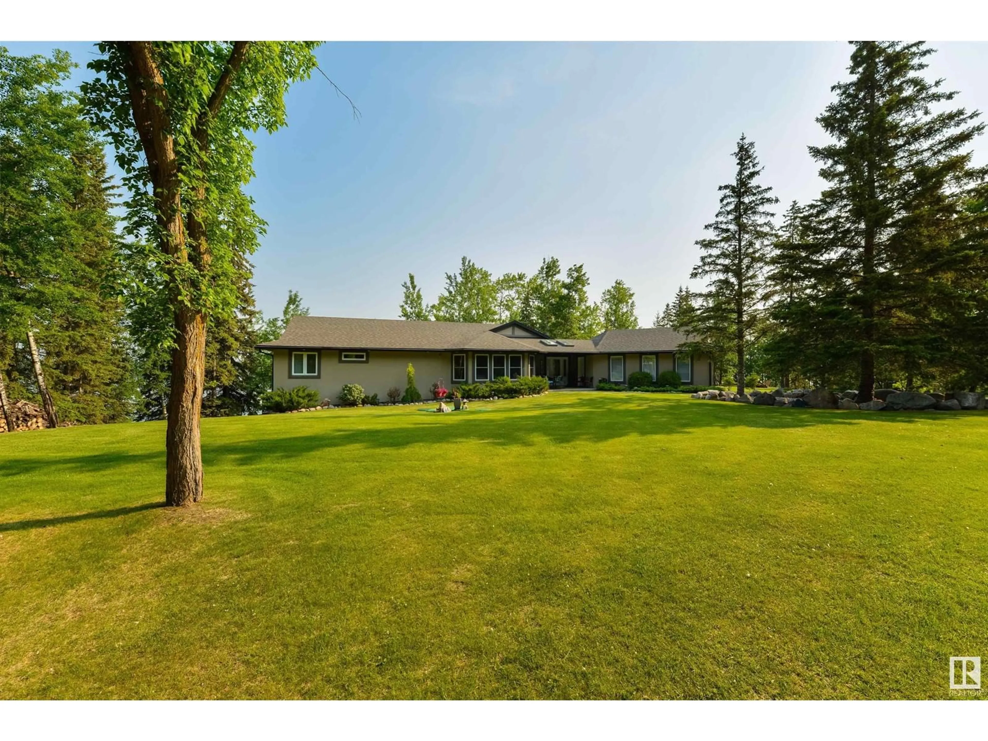 A pic from outside/outdoor area/front of a property/back of a property/a pic from drone, unknown for 18 TWP ROAD 565 TWP ROAD, Rural Lac Ste. Anne County Alberta T0E1V0