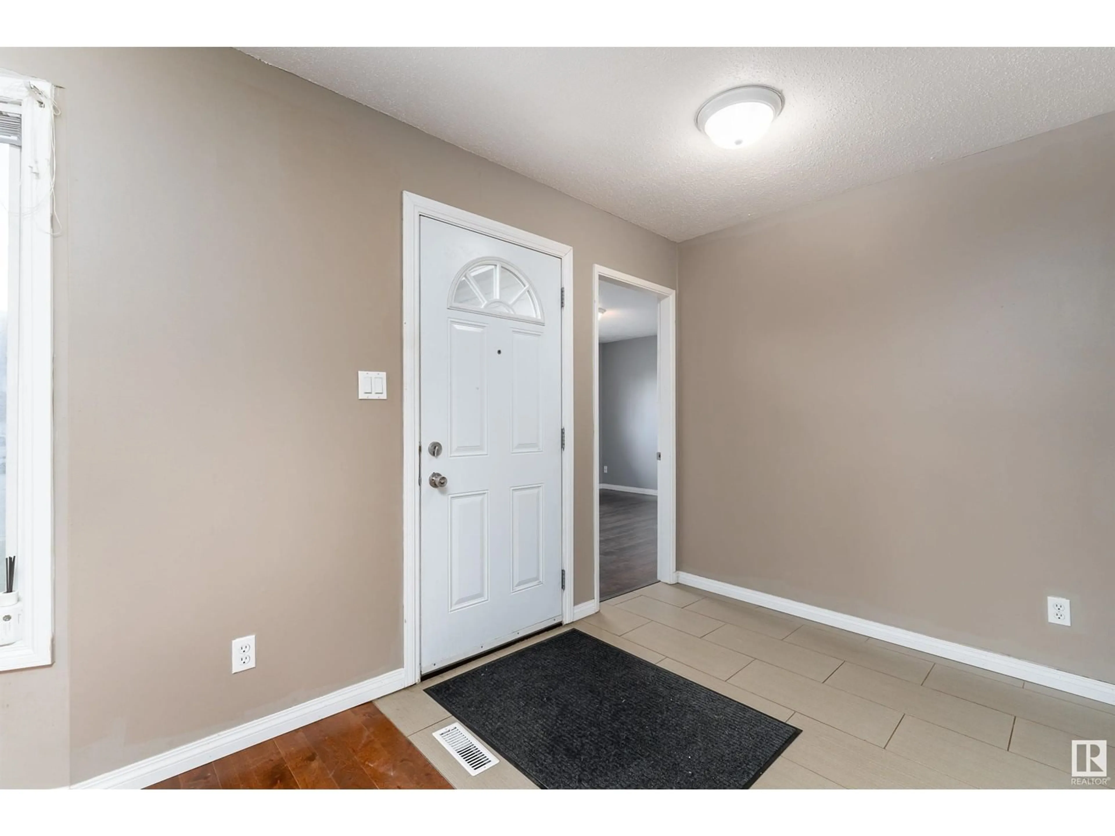 Indoor entryway for 11448 152 AV, Edmonton Alberta T5X1C7