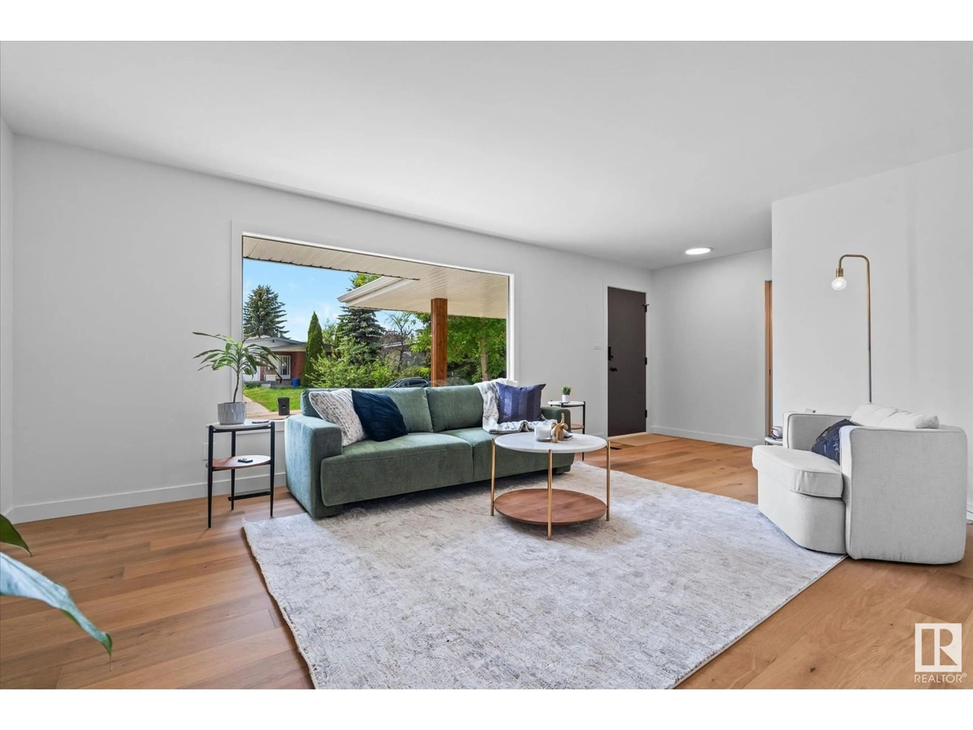 Living room with furniture, wood/laminate floor for 23 GRANVILLE CR, Sherwood Park Alberta T8B0B1