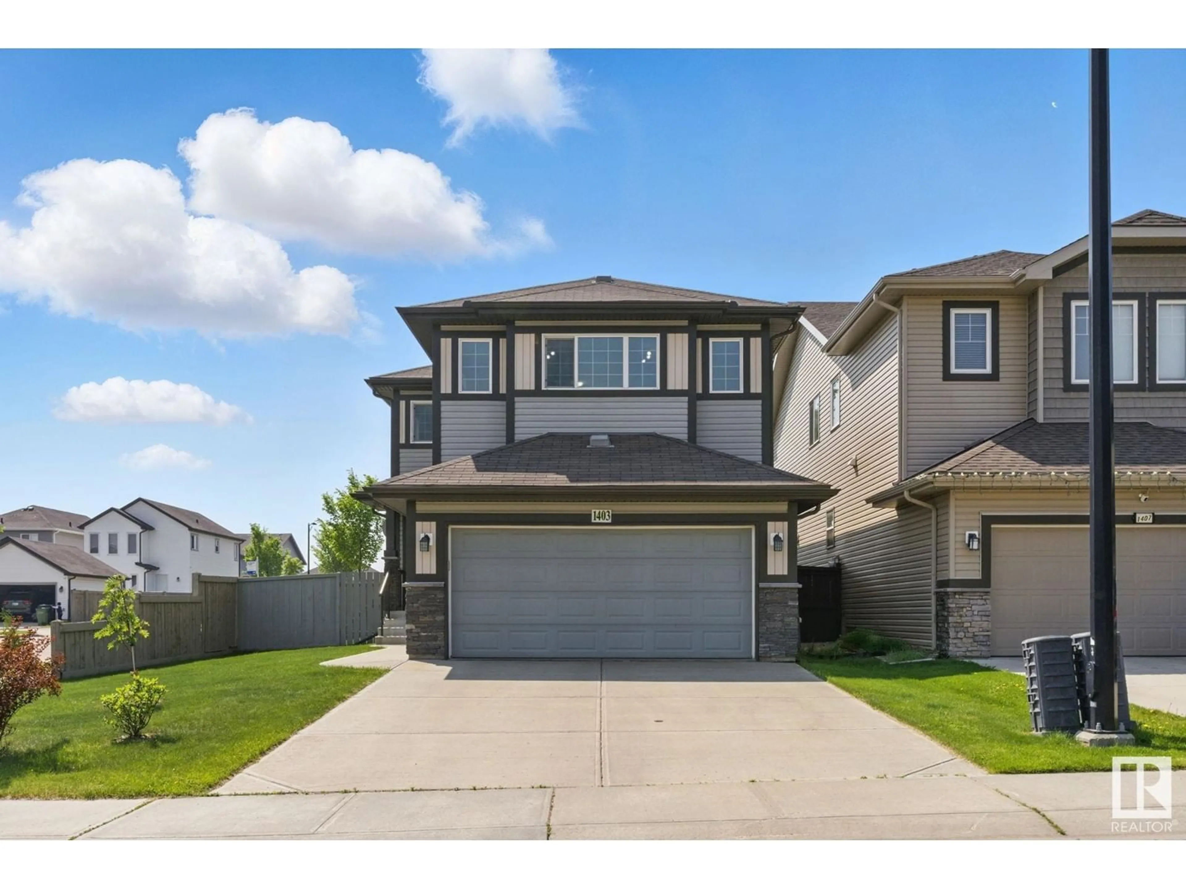 Home with vinyl exterior material, street for NW - 1403 30 AV, Edmonton Alberta T6T0V7