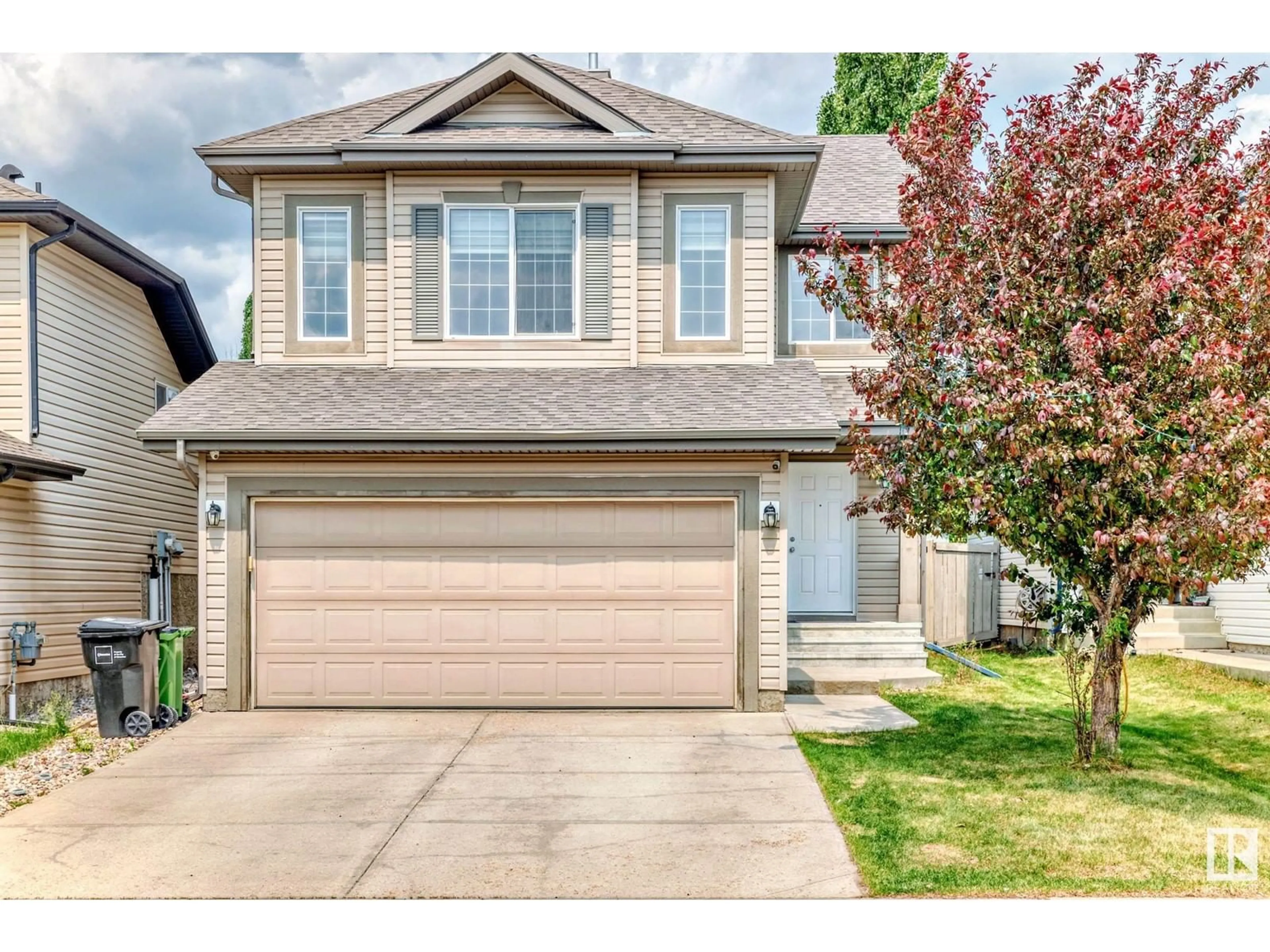 Home with vinyl exterior material, street for SW - 7728 7A AV, Edmonton Alberta T6X0A2