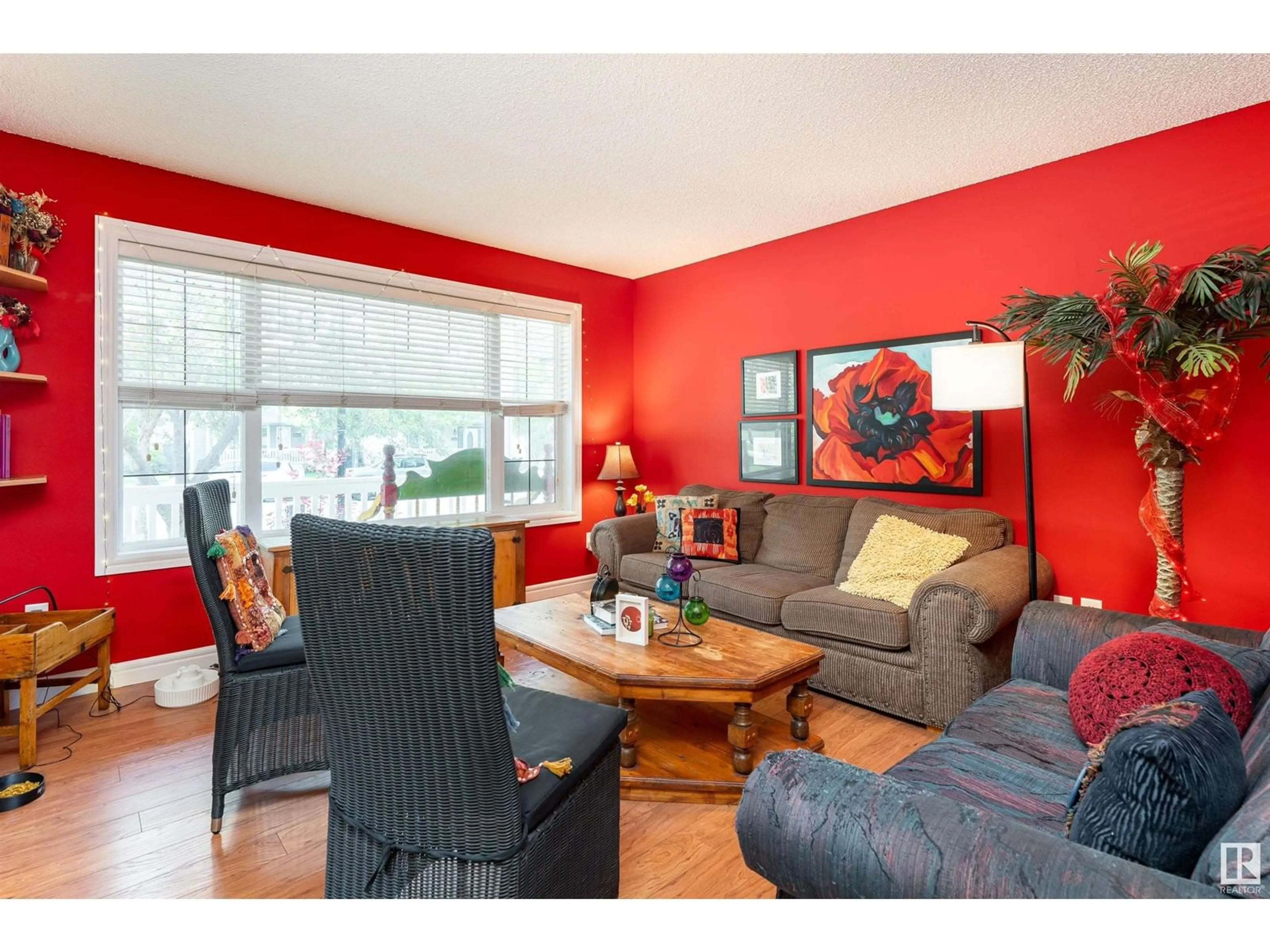 Living room with furniture, wood/laminate floor for 20308 53 AV, Edmonton Alberta T6M2Y9
