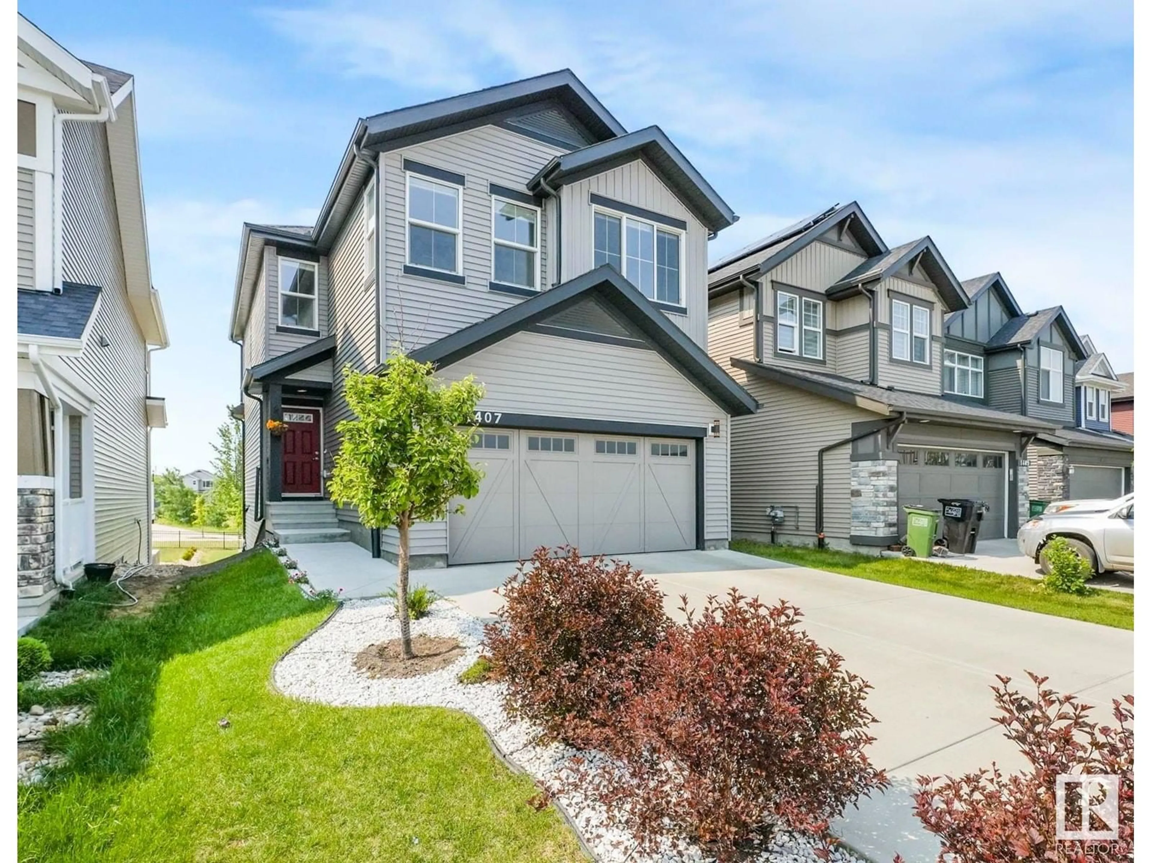 Home with vinyl exterior material, street for 1407 DARBY GR, Edmonton Alberta T6W4N4