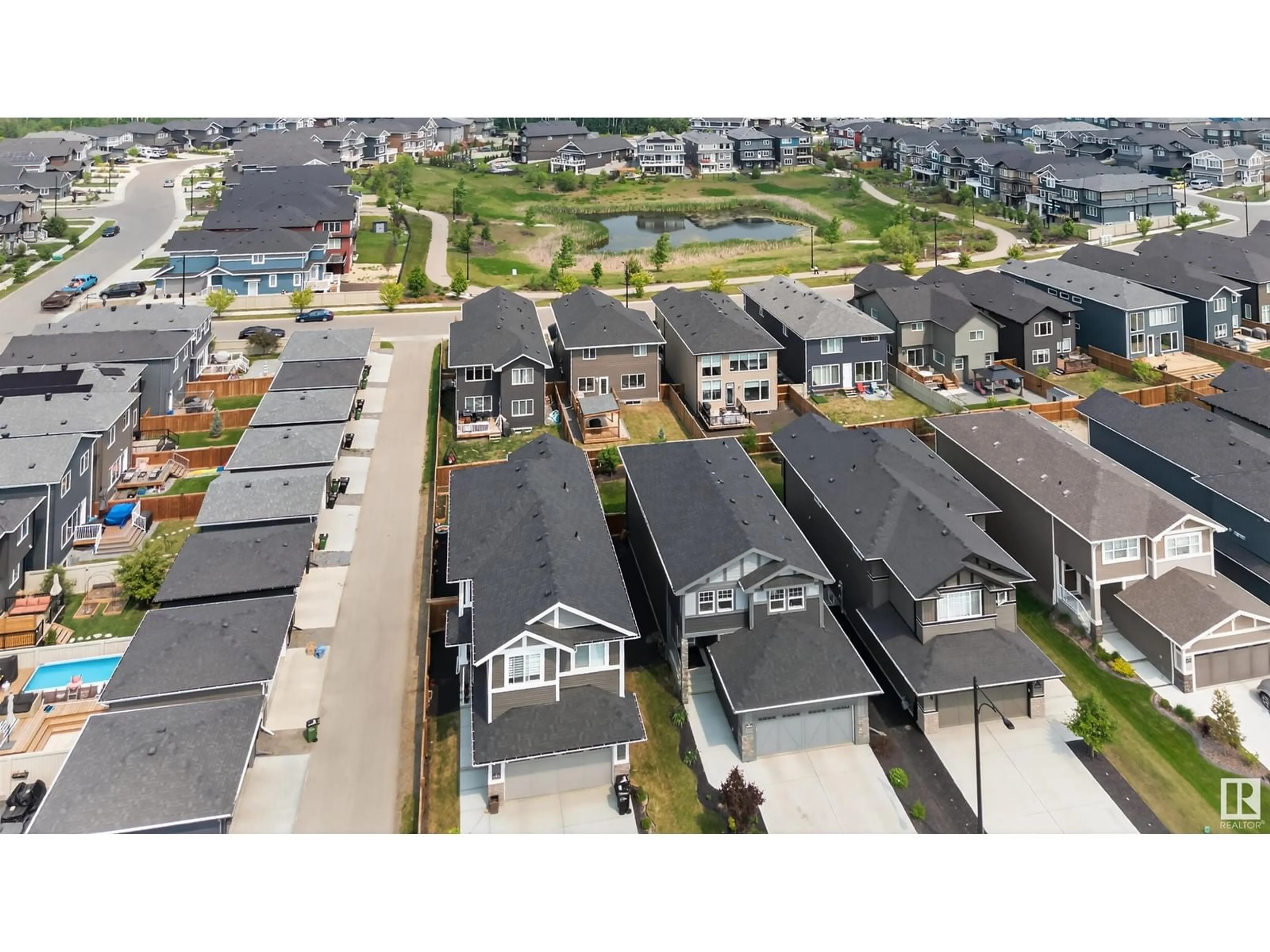 A pic from outside/outdoor area/front of a property/back of a property/a pic from drone, street for 1614 ENRIGHT WY, Edmonton Alberta T6M0Z3