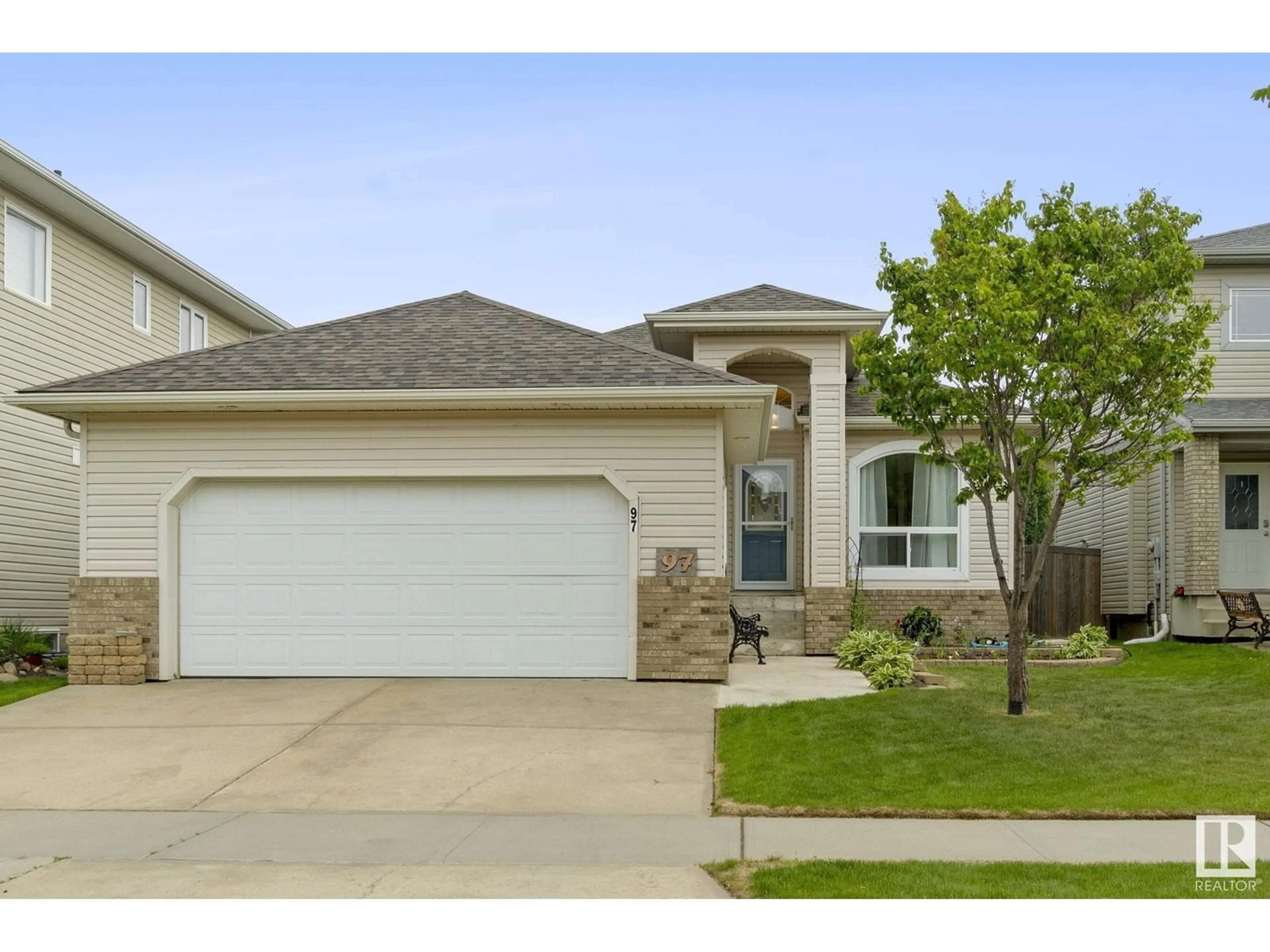 Home with vinyl exterior material, street for 97 LAKEWOOD BV, Beaumont Alberta T4X1T3