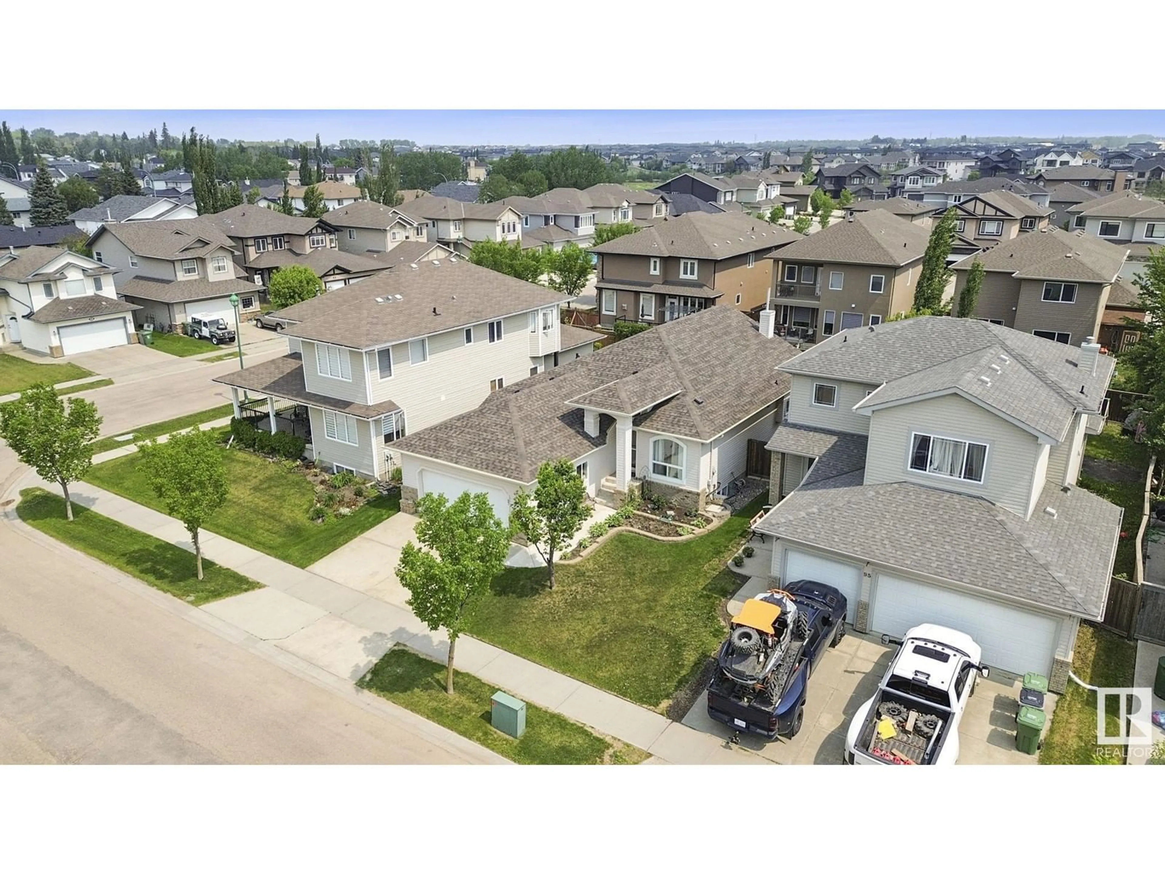 A pic from outside/outdoor area/front of a property/back of a property/a pic from drone, street for 97 LAKEWOOD BV, Beaumont Alberta T4X1T3