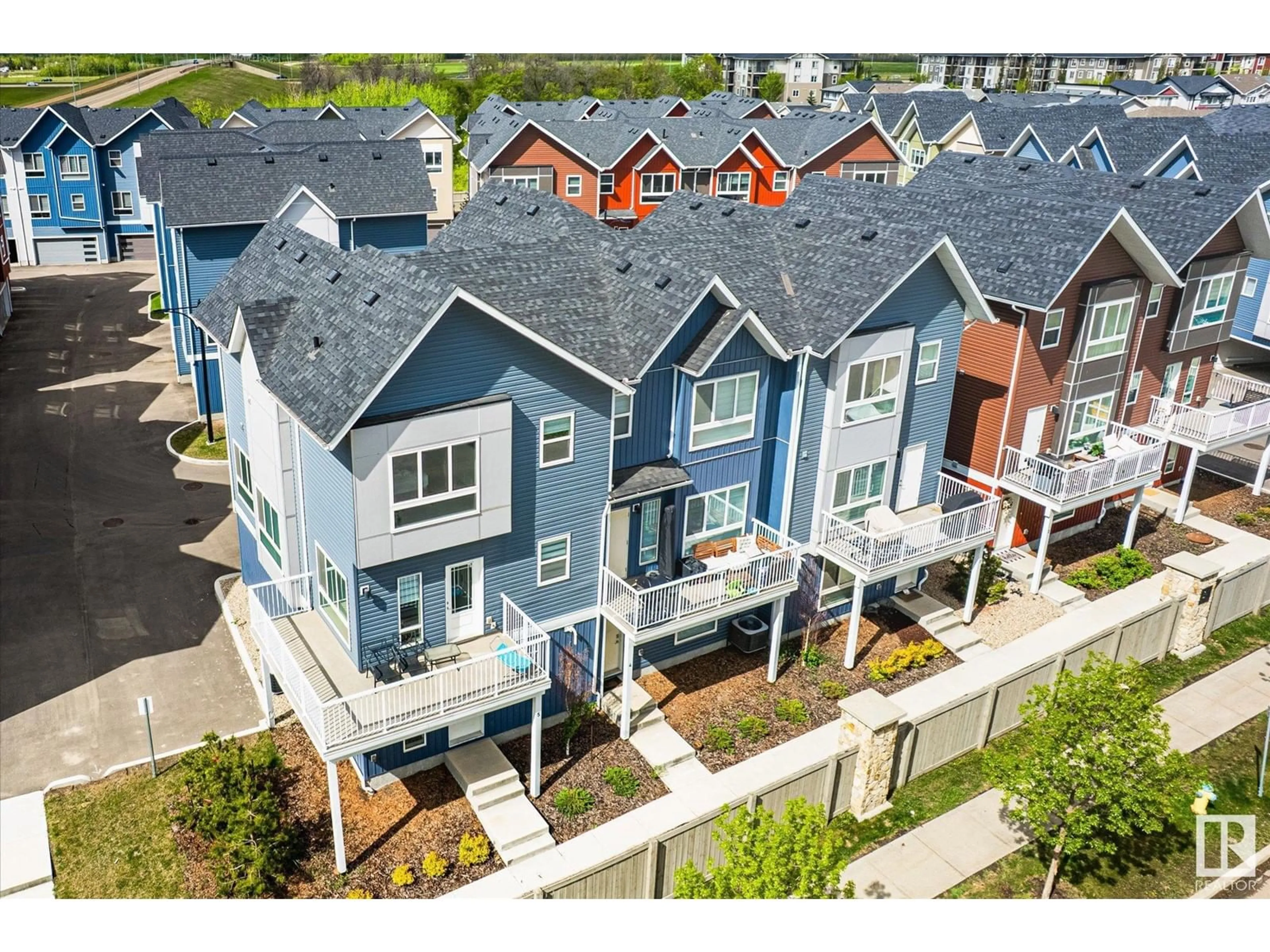 A pic from outside/outdoor area/front of a property/back of a property/a pic from drone, street for #4 - 979 CRYSTALLINA NERA WY, Edmonton Alberta T5Z0S3