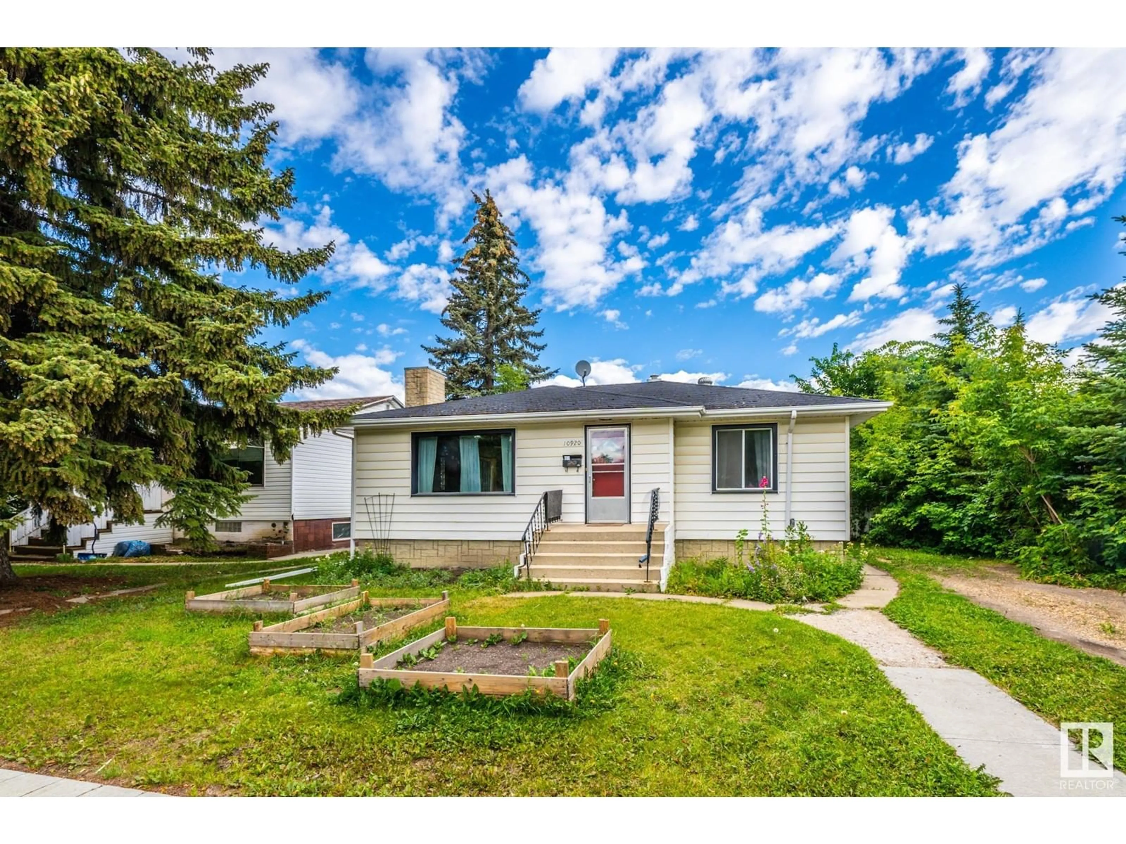 Home with vinyl exterior material, street for 10920 68 AV, Edmonton Alberta T6H2C1