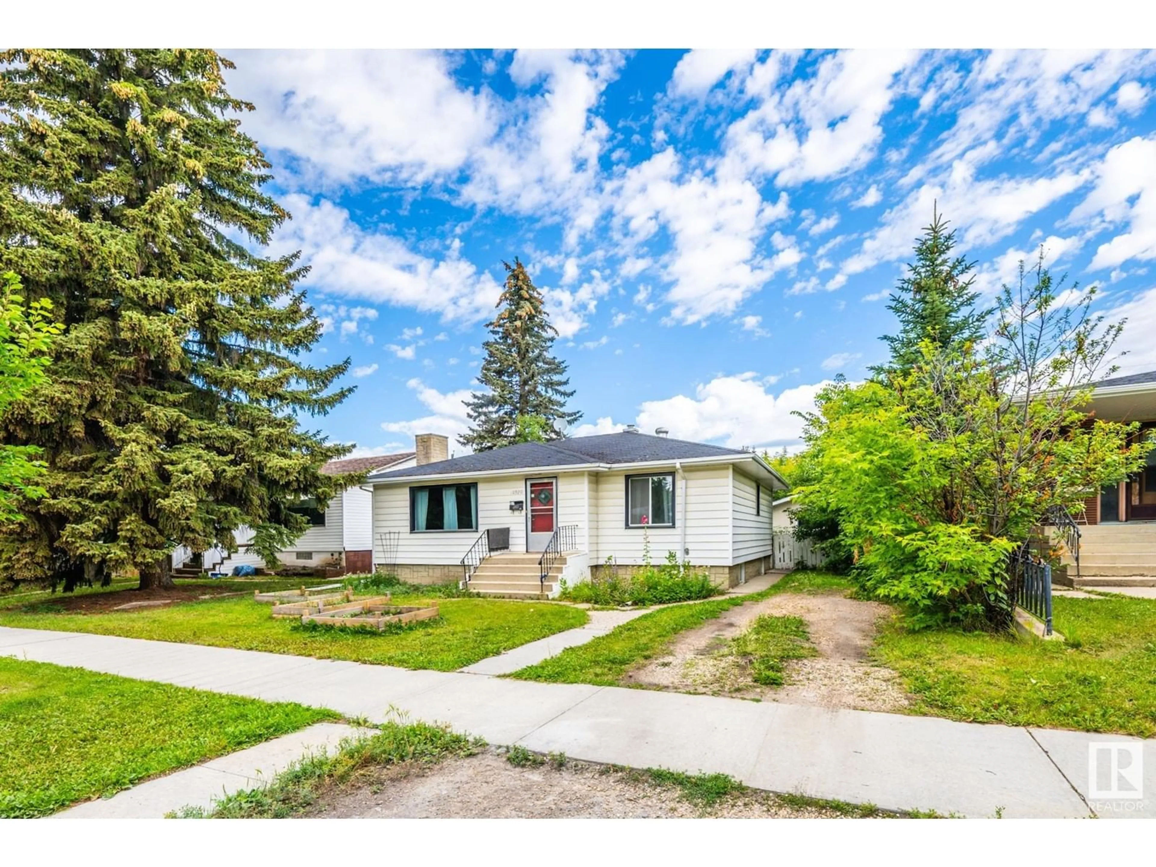 Home with vinyl exterior material, street for 10920 68 AV, Edmonton Alberta T6H2C1