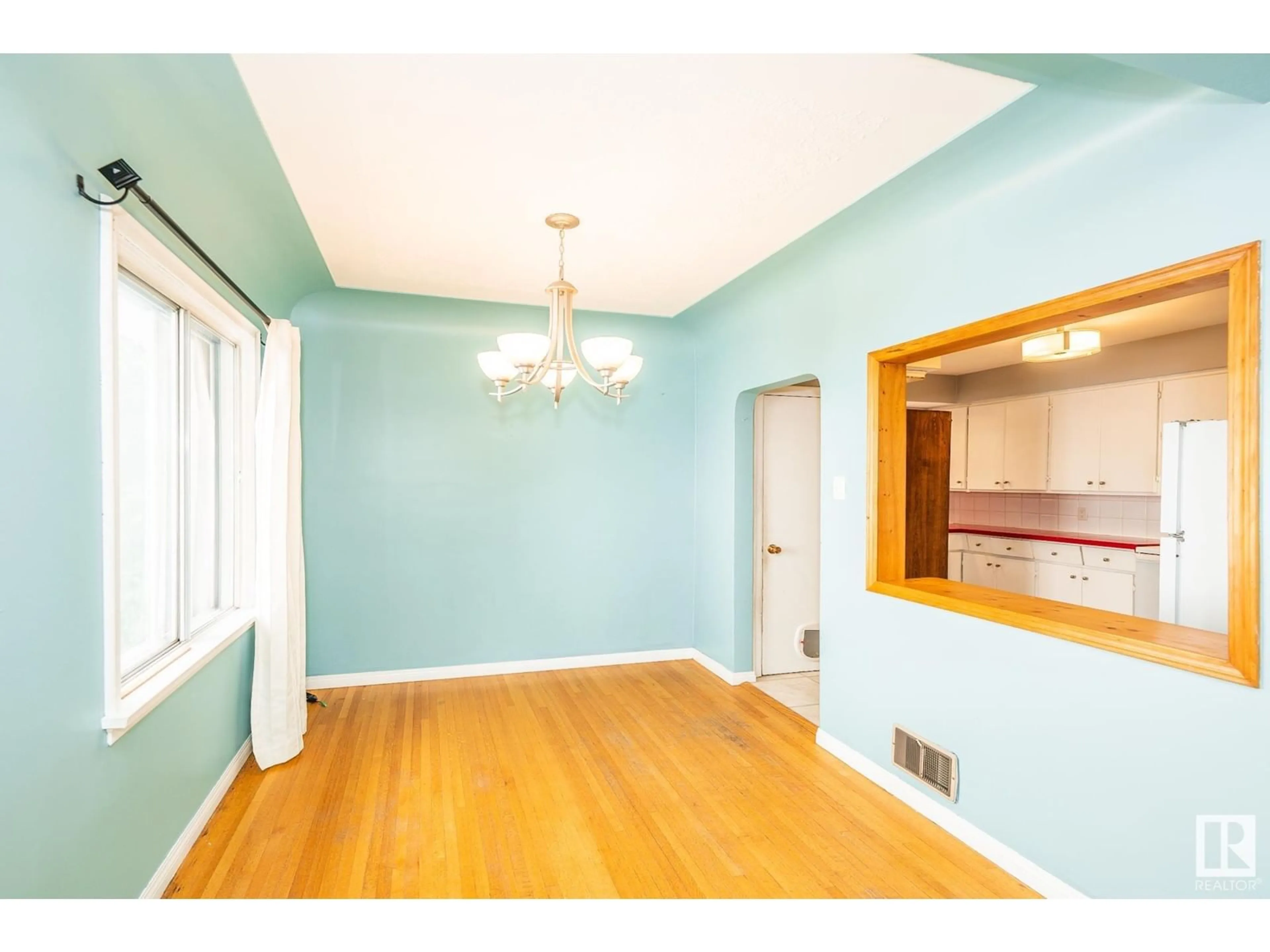 Dining room, wood/laminate floor for 10920 68 AV, Edmonton Alberta T6H2C1