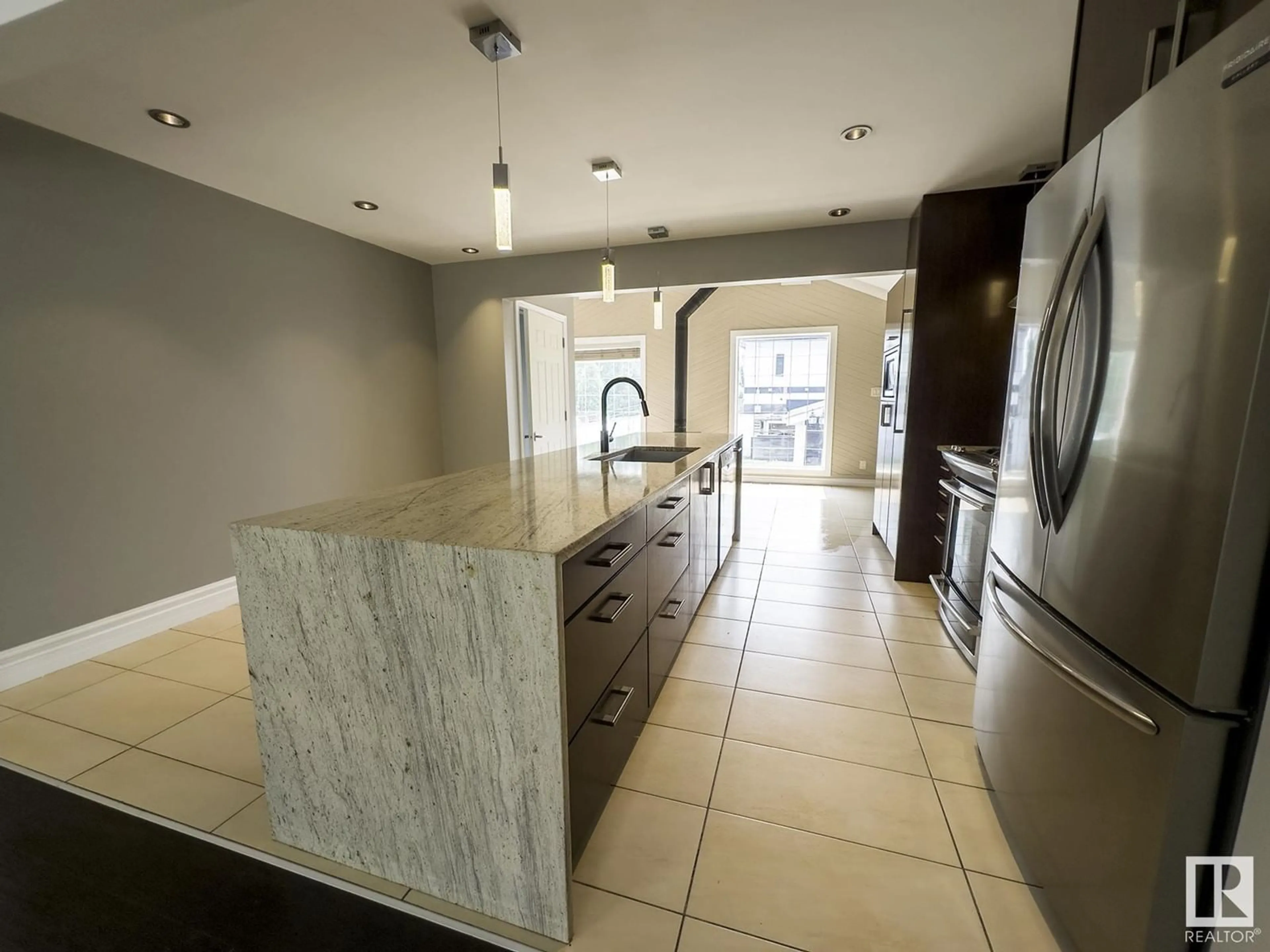 Open concept kitchen, ceramic/tile floor for NW - 15861 109 AV, Edmonton Alberta T5P1B5