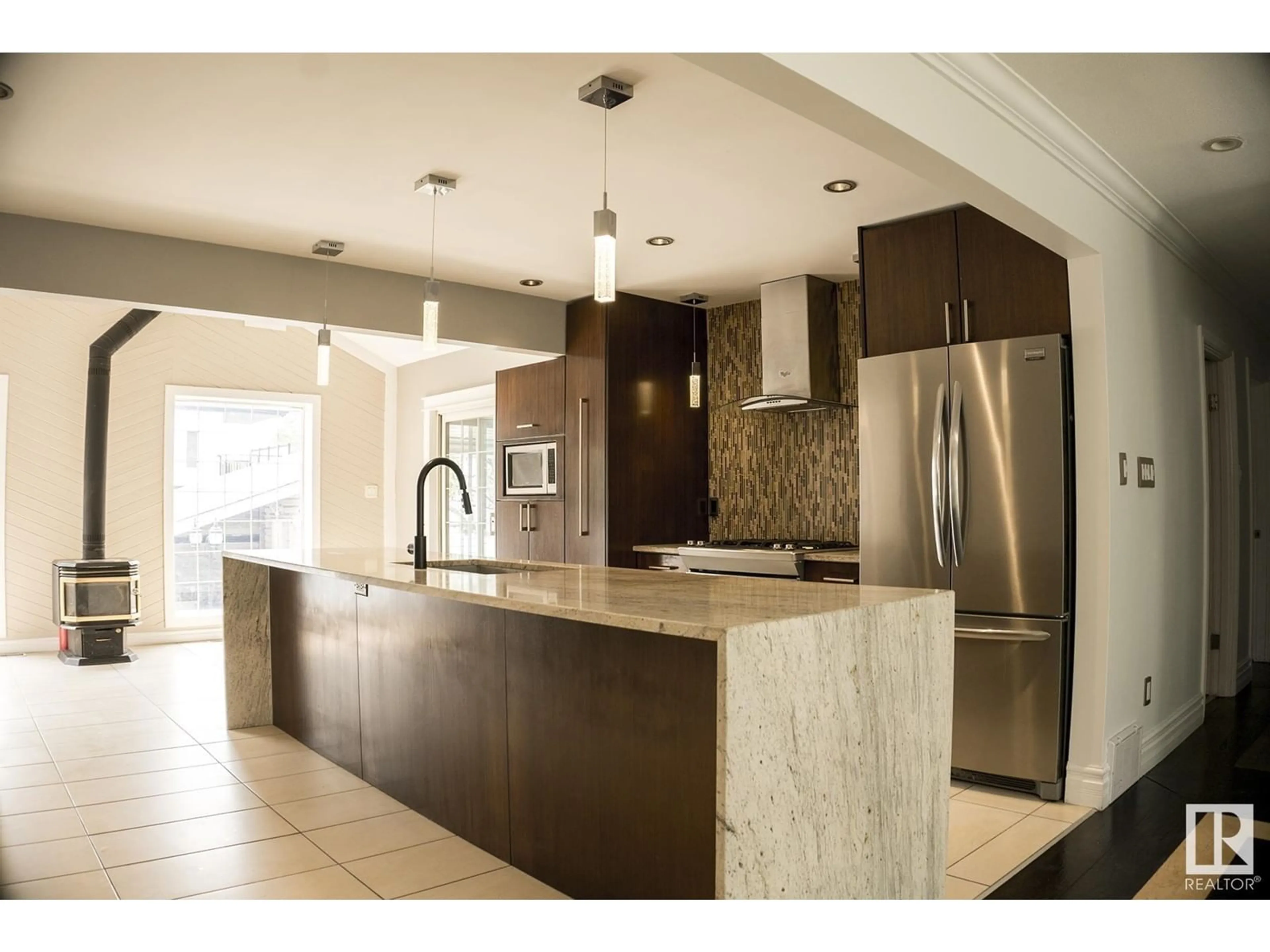 Open concept kitchen, ceramic/tile floor for NW - 15861 109 AV, Edmonton Alberta T5P1B5
