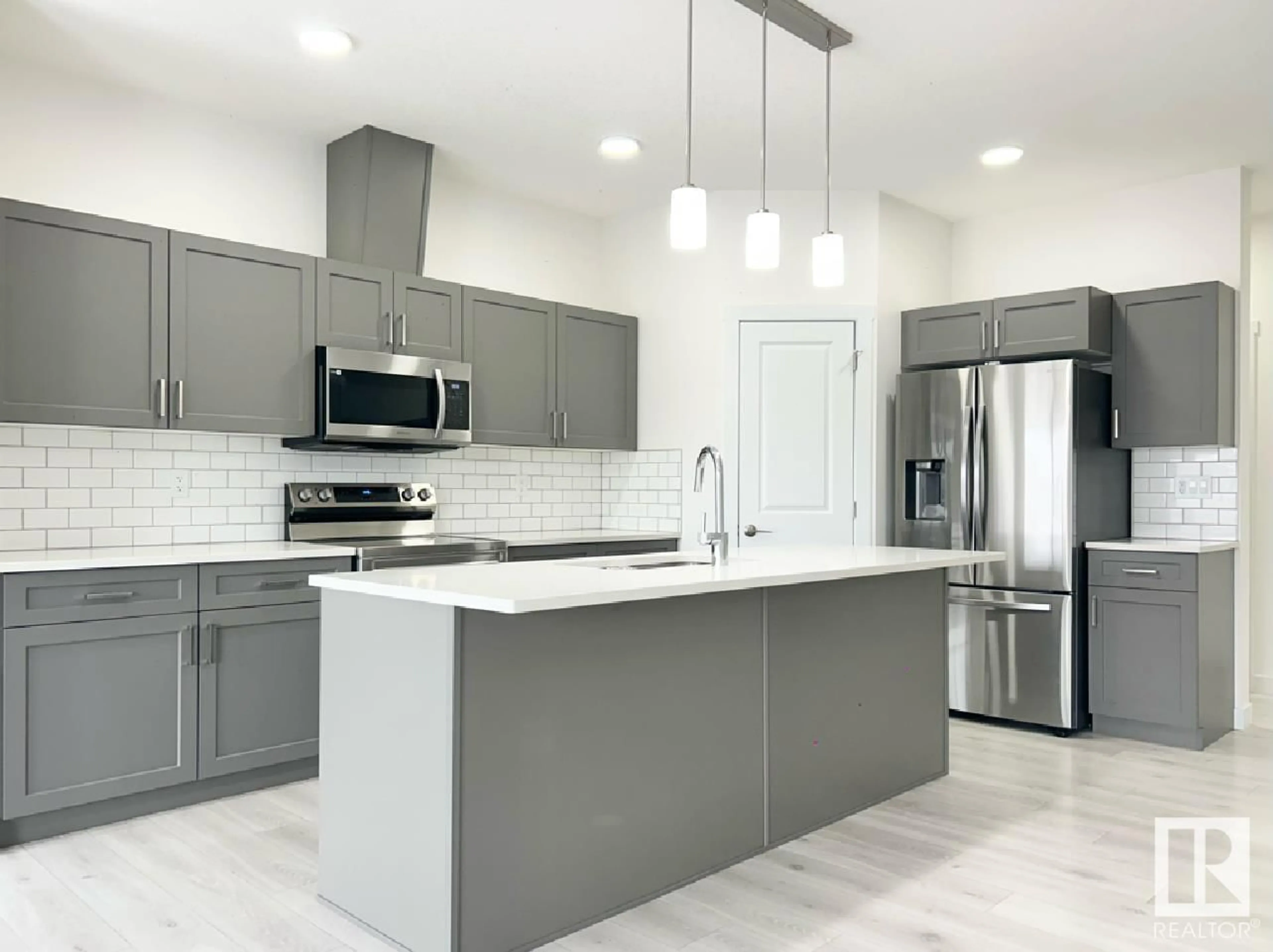 Open concept kitchen, unknown for 19706 29 AV, Edmonton Alberta T6M1M2