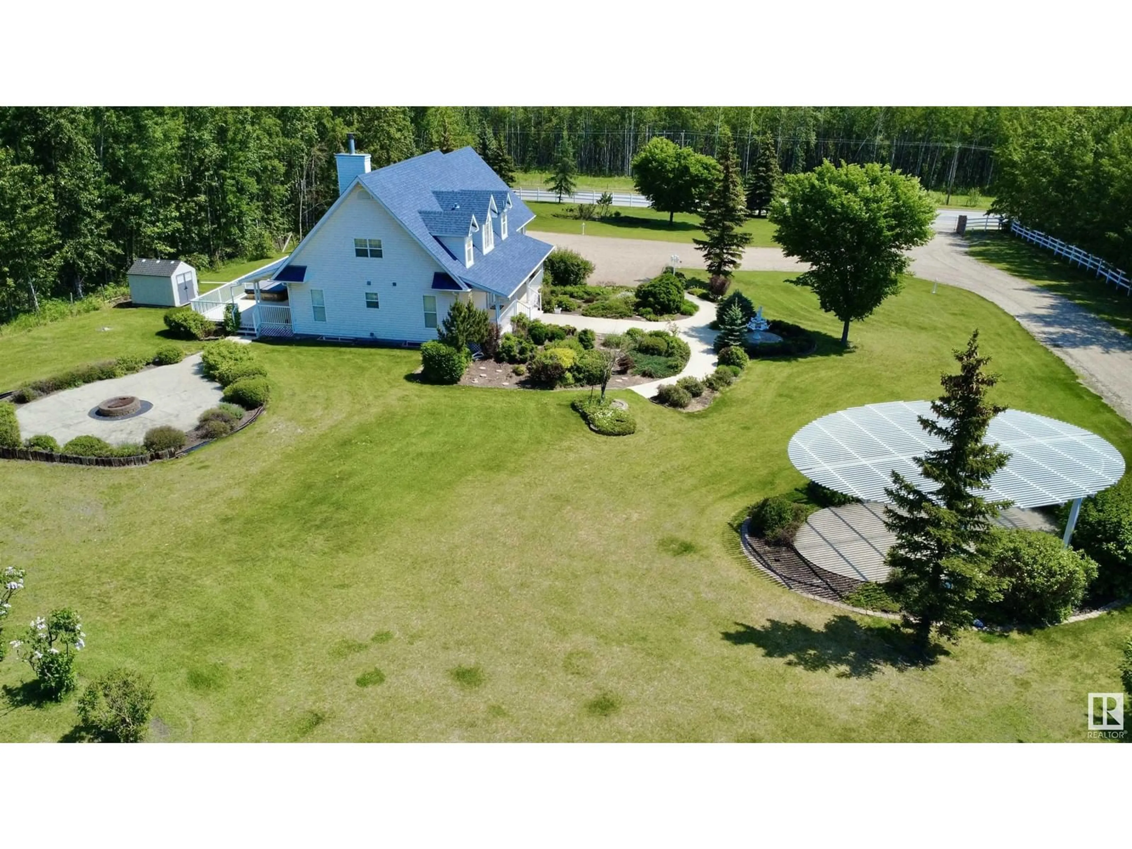 A pic from outside/outdoor area/front of a property/back of a property/a pic from drone, mountain view for 49022B RR 73, Rural Brazeau County Alberta T7A2A2