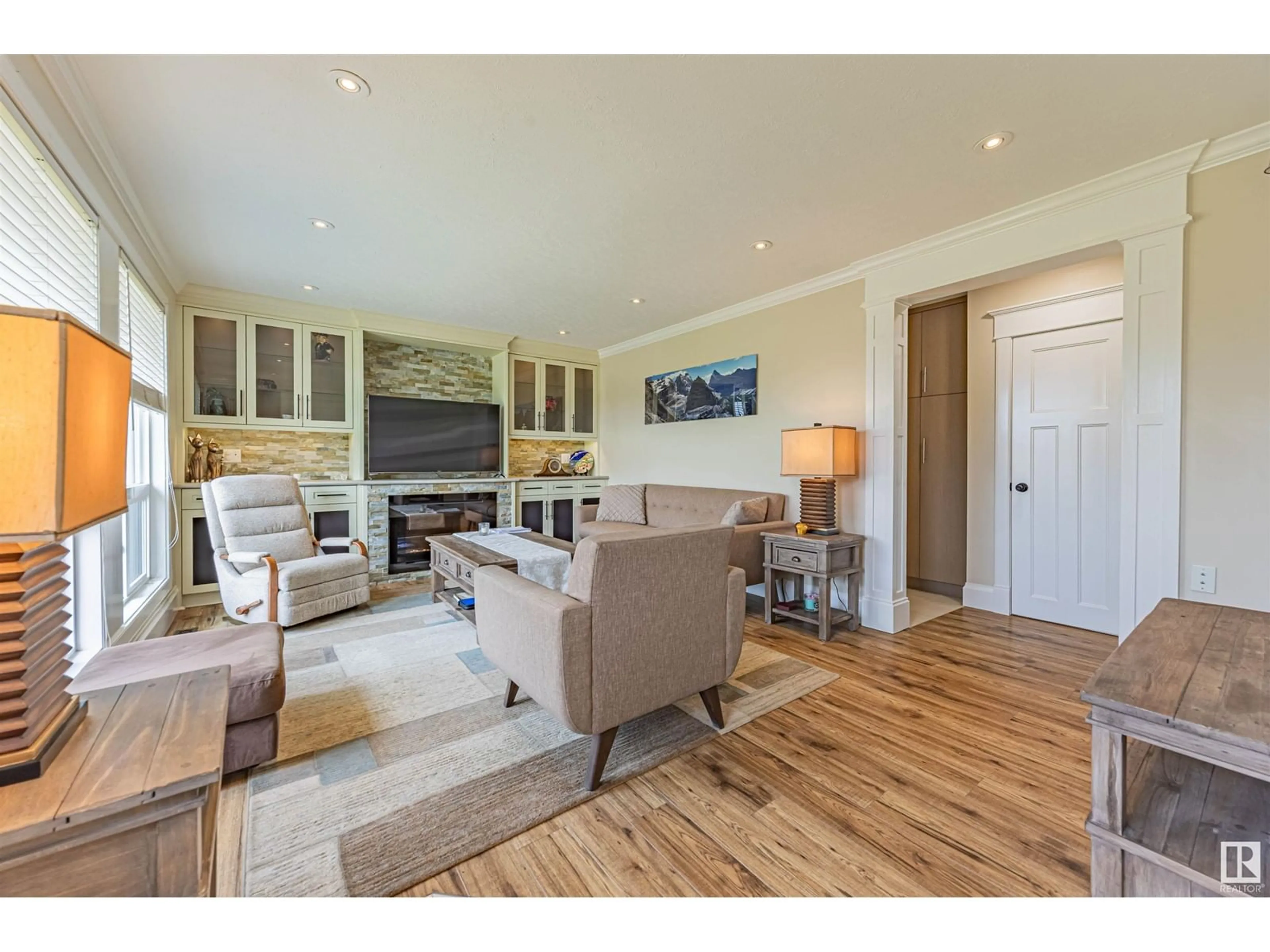 Living room with furniture, wood/laminate floor for 9027 154 ST, Edmonton Alberta T5R1T1